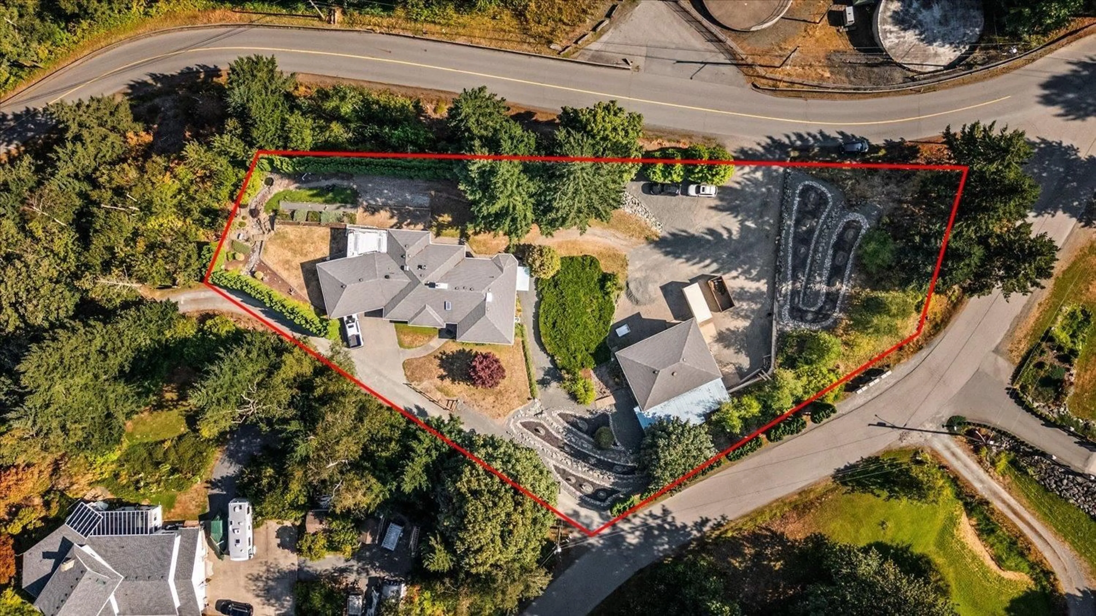 A pic from outside/outdoor area/front of a property/back of a property/a pic from drone, street for 8570 PRIMROSE DRIVE, Chilliwack British Columbia V2R4A3