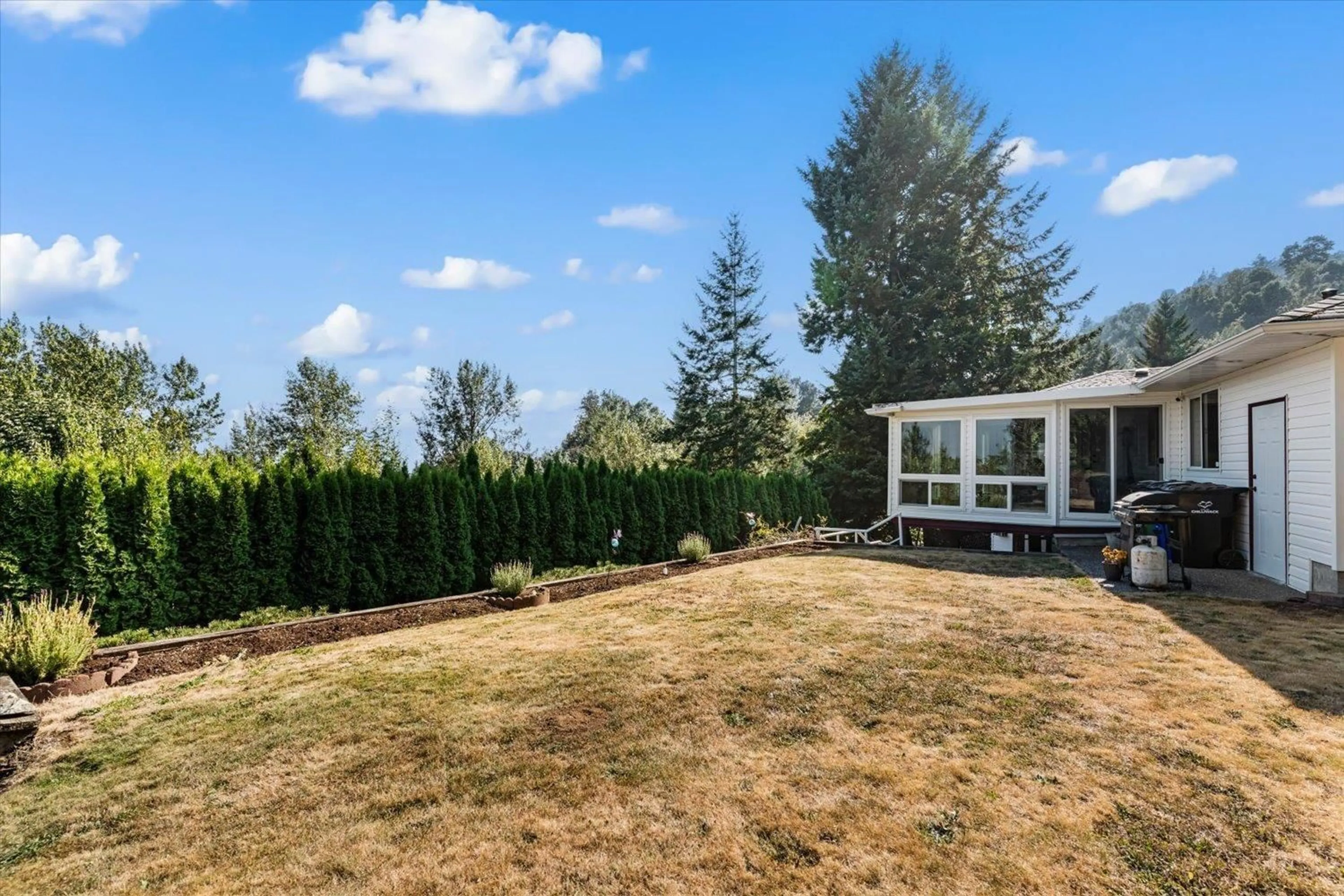 Patio, forest/trees view for 8570 PRIMROSE DRIVE, Chilliwack British Columbia V2R4A3