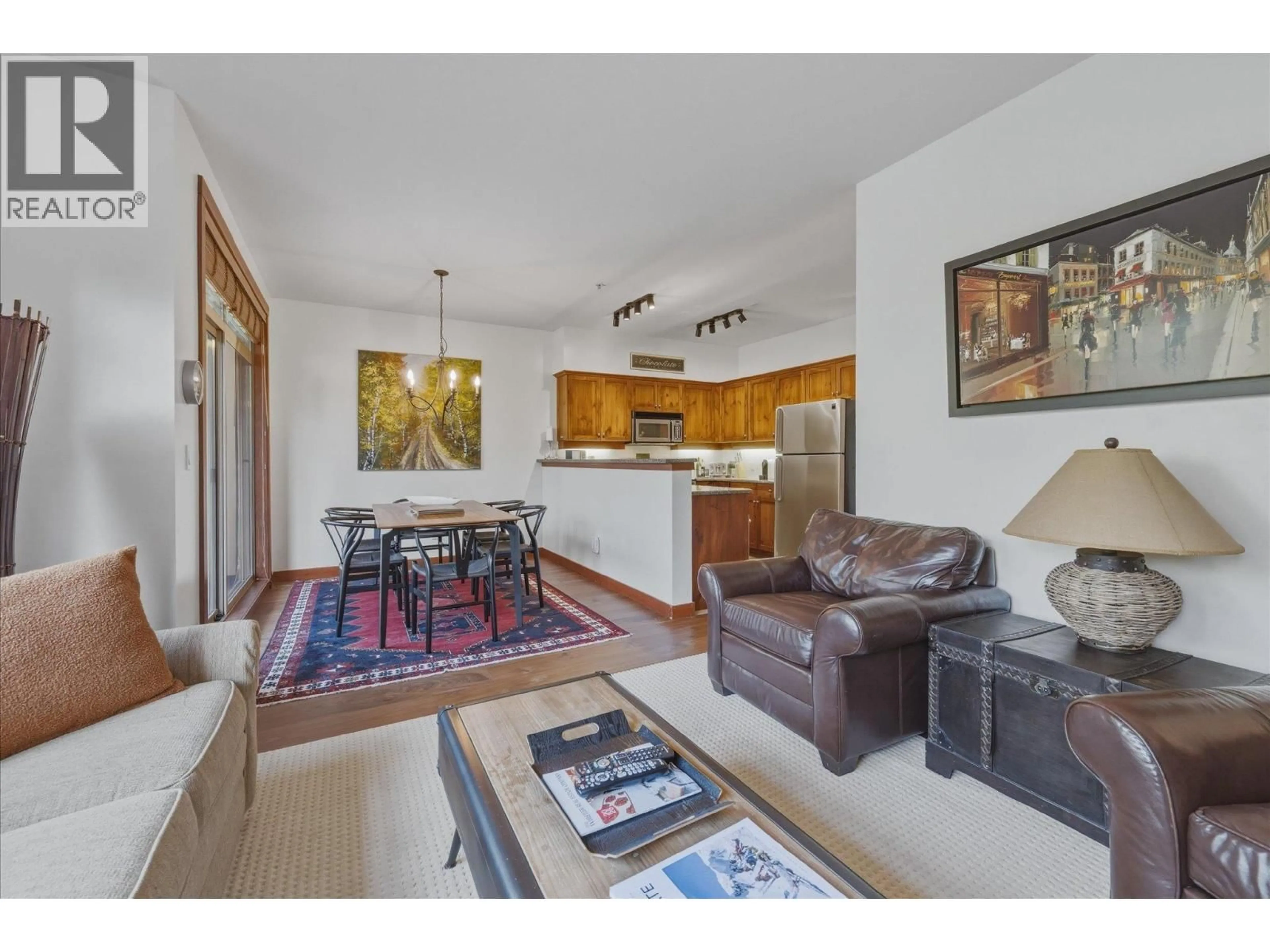 Living room with furniture, wood/laminate floor for 25 - 2301 TALUSWOOD PLACE, Whistler British Columbia V8E0P8