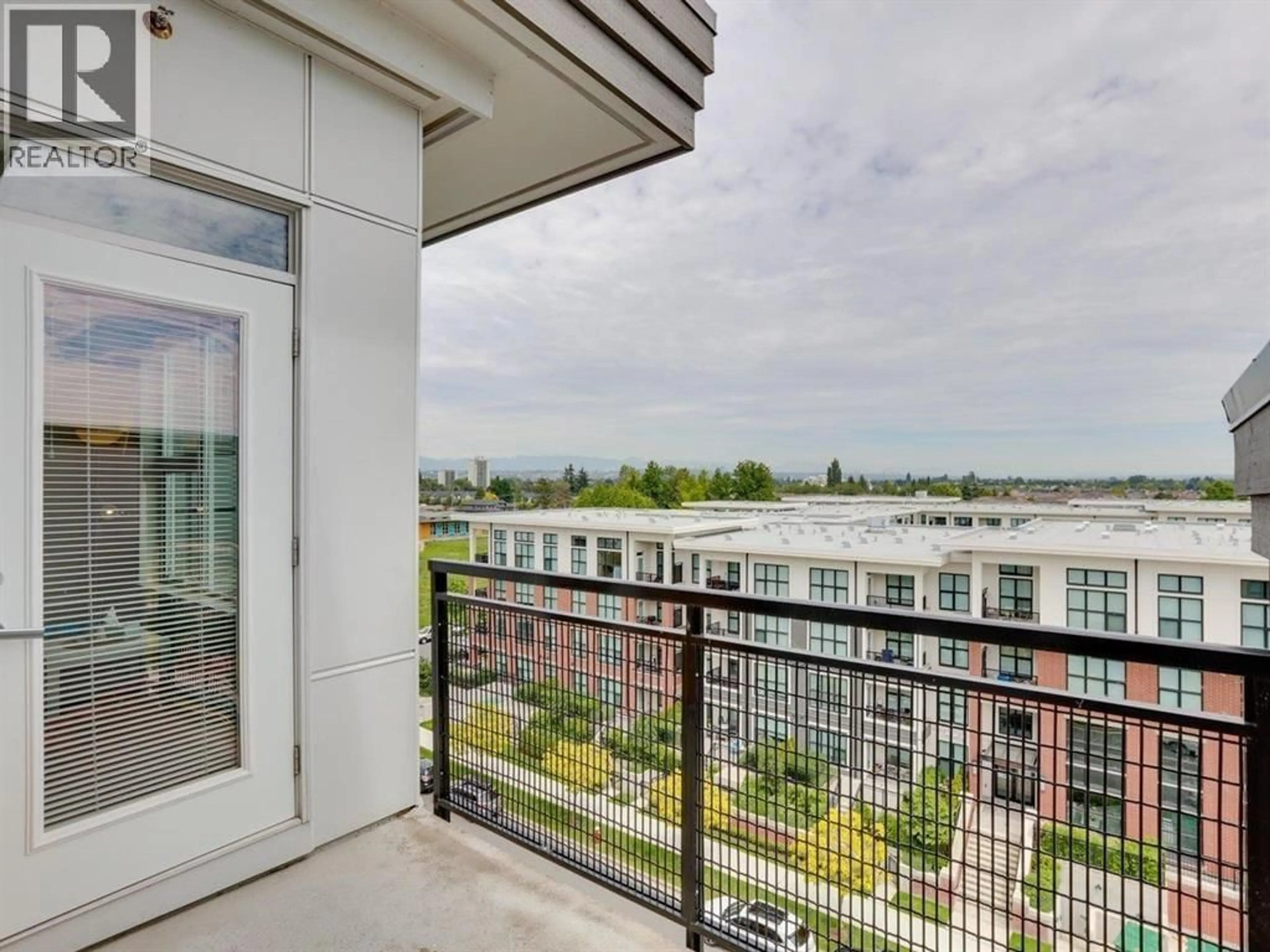 Balcony in the apartment, city buildings view from balcony for 613 - 9388 TOMICKI AVENUE, Richmond British Columbia V6X0P1