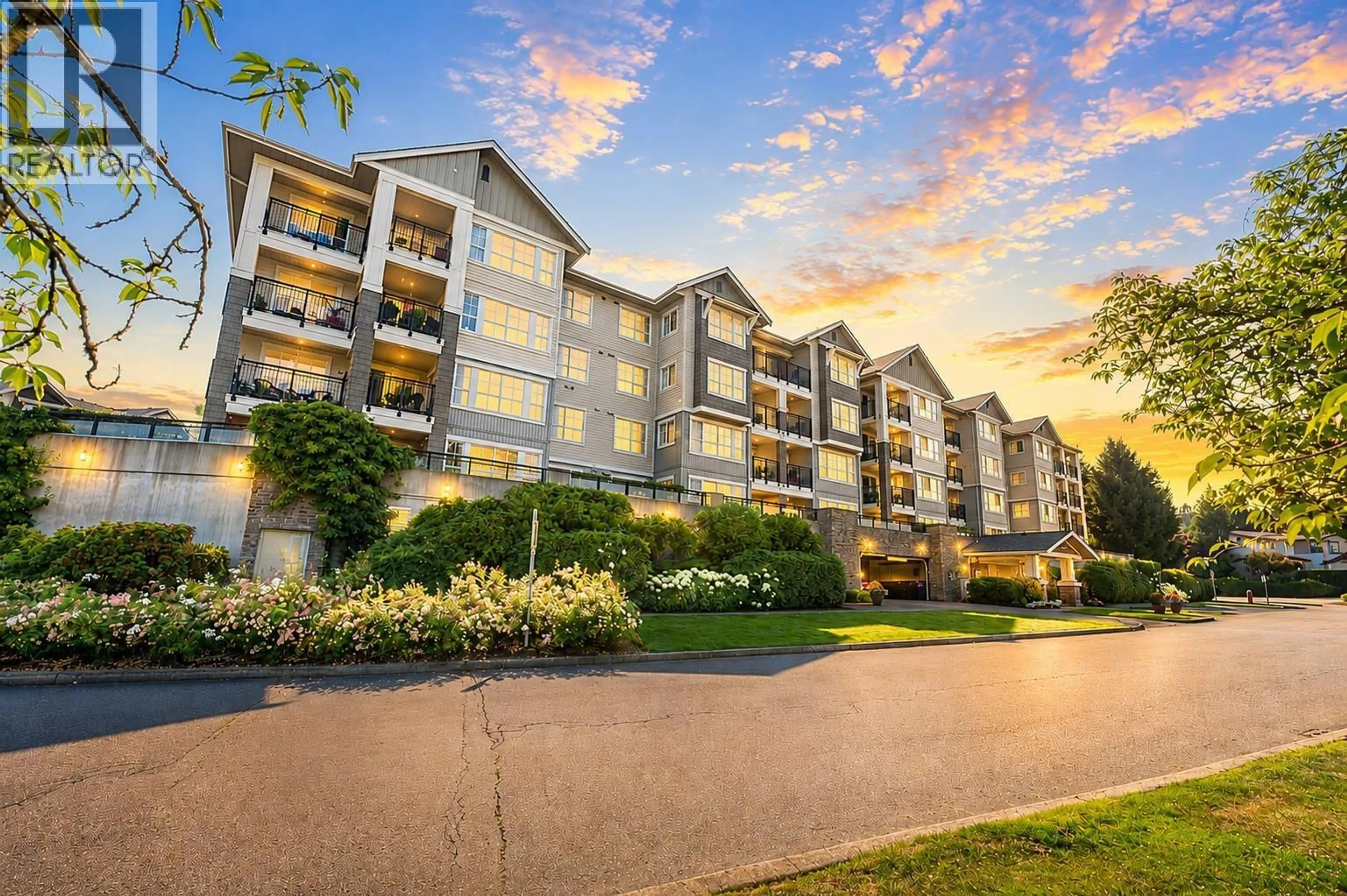 A pic from outside/outdoor area/front of a property/back of a property/a pic from drone, unknown for 207 - 19673 MEADOW GARDENS WAY, Pitt Meadows British Columbia V3Y0A1