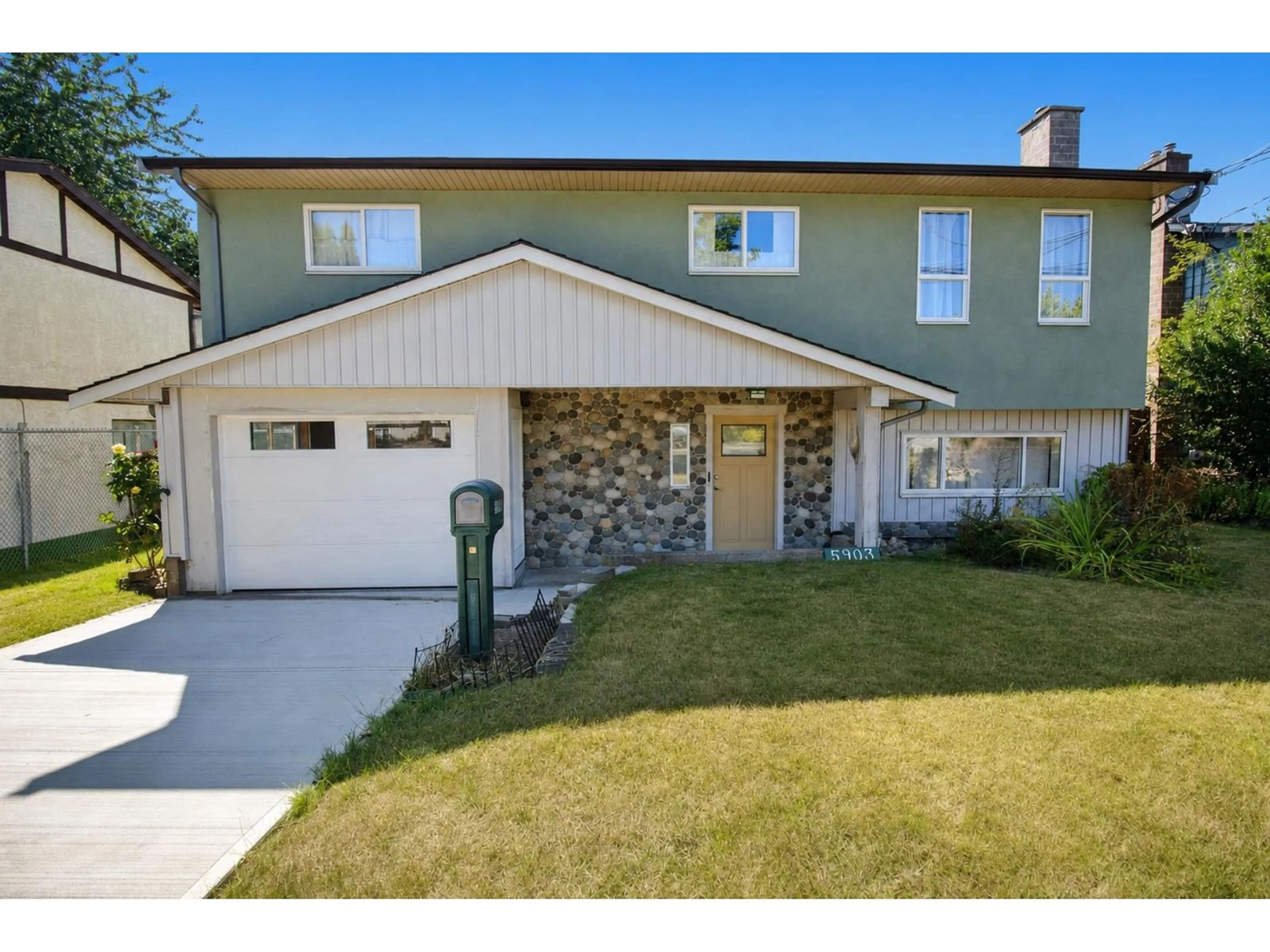 Home with vinyl exterior material, street for 5903 184 STREET, Surrey British Columbia V3S4N2
