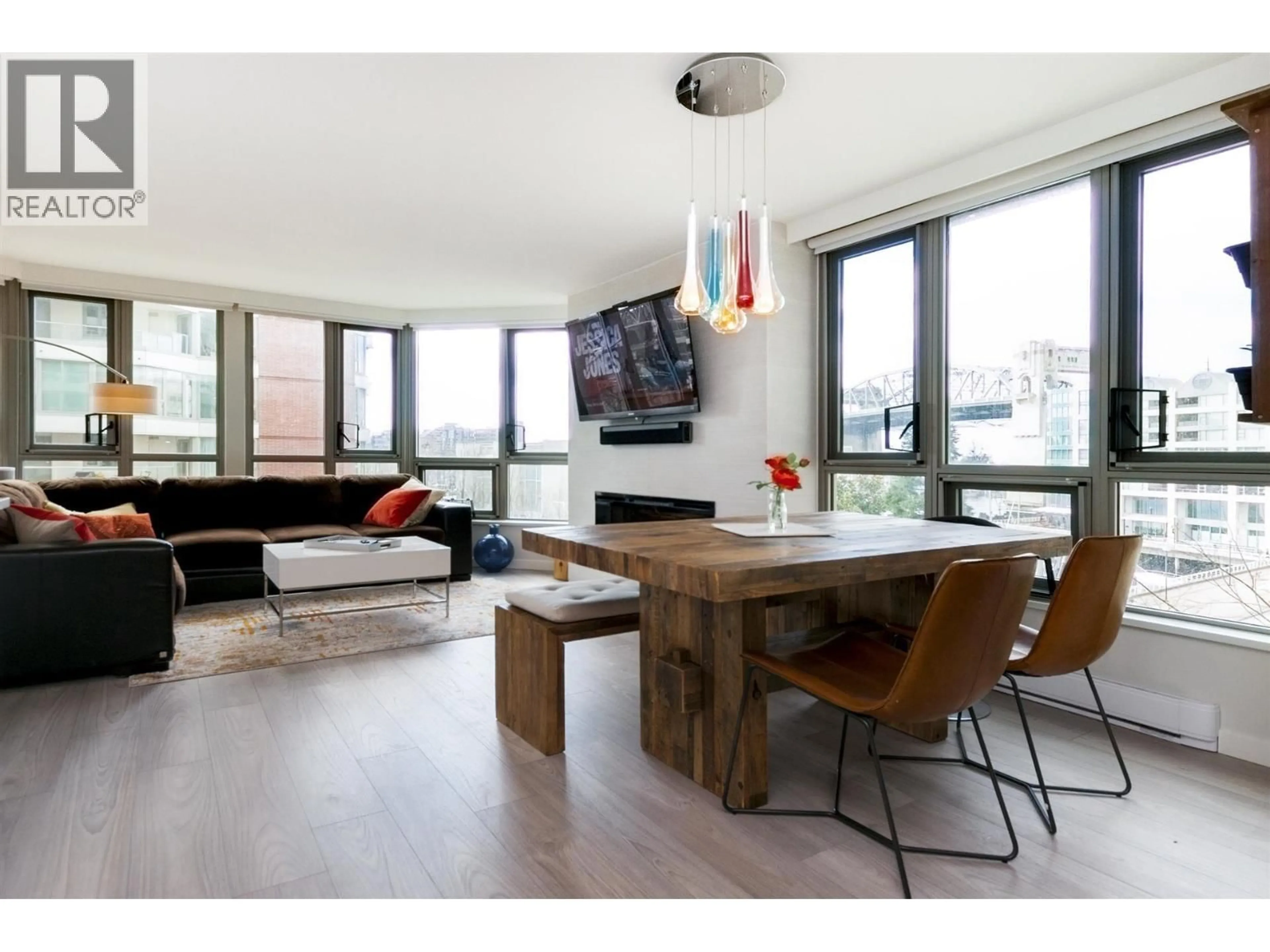 Living room with furniture, wood/laminate floor for 303 - 1625 HORNBY STREET, Vancouver British Columbia V6Z2M2