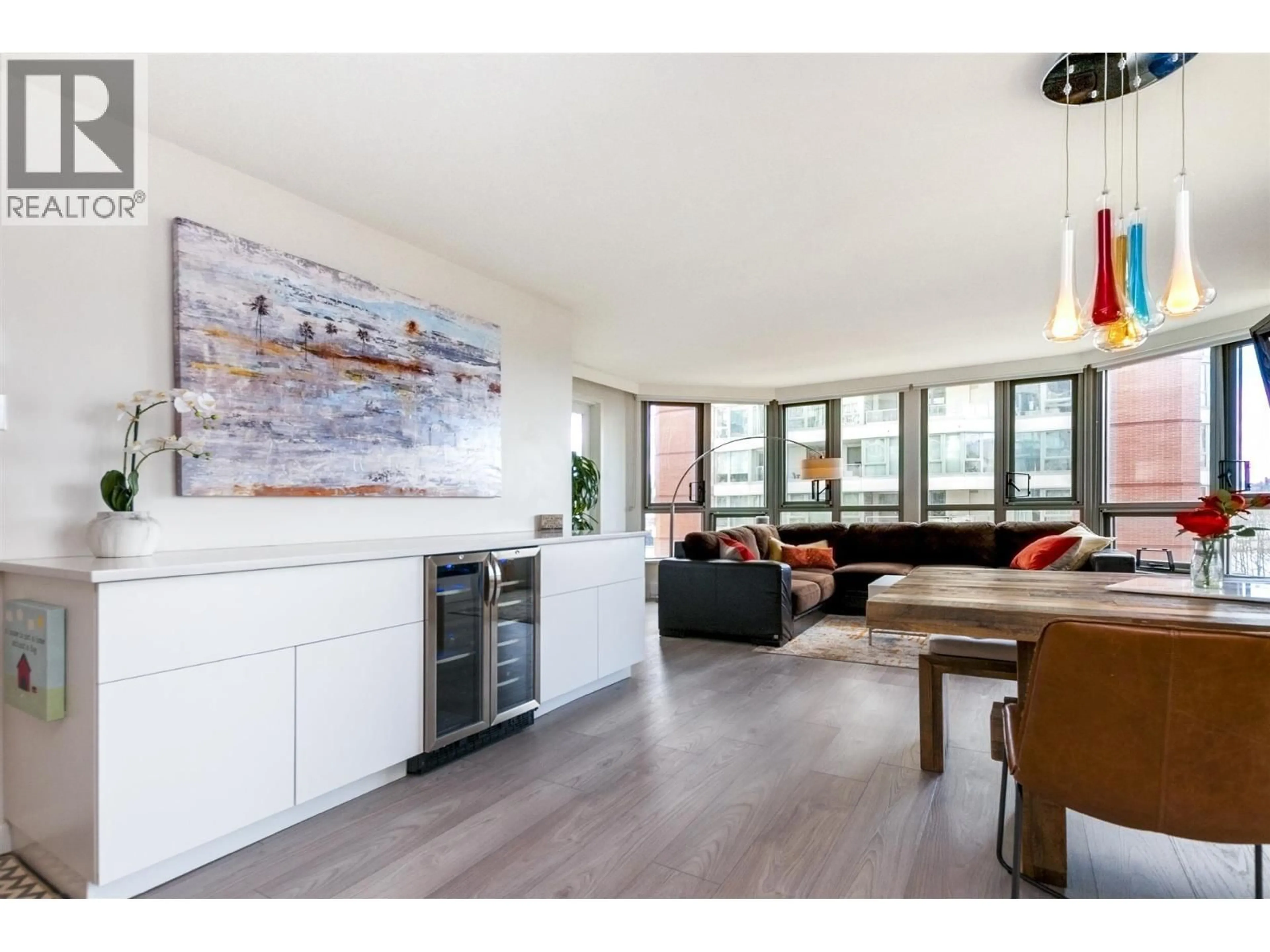 Living room with furniture, wood/laminate floor for 303 - 1625 HORNBY STREET, Vancouver British Columbia V6Z2M2