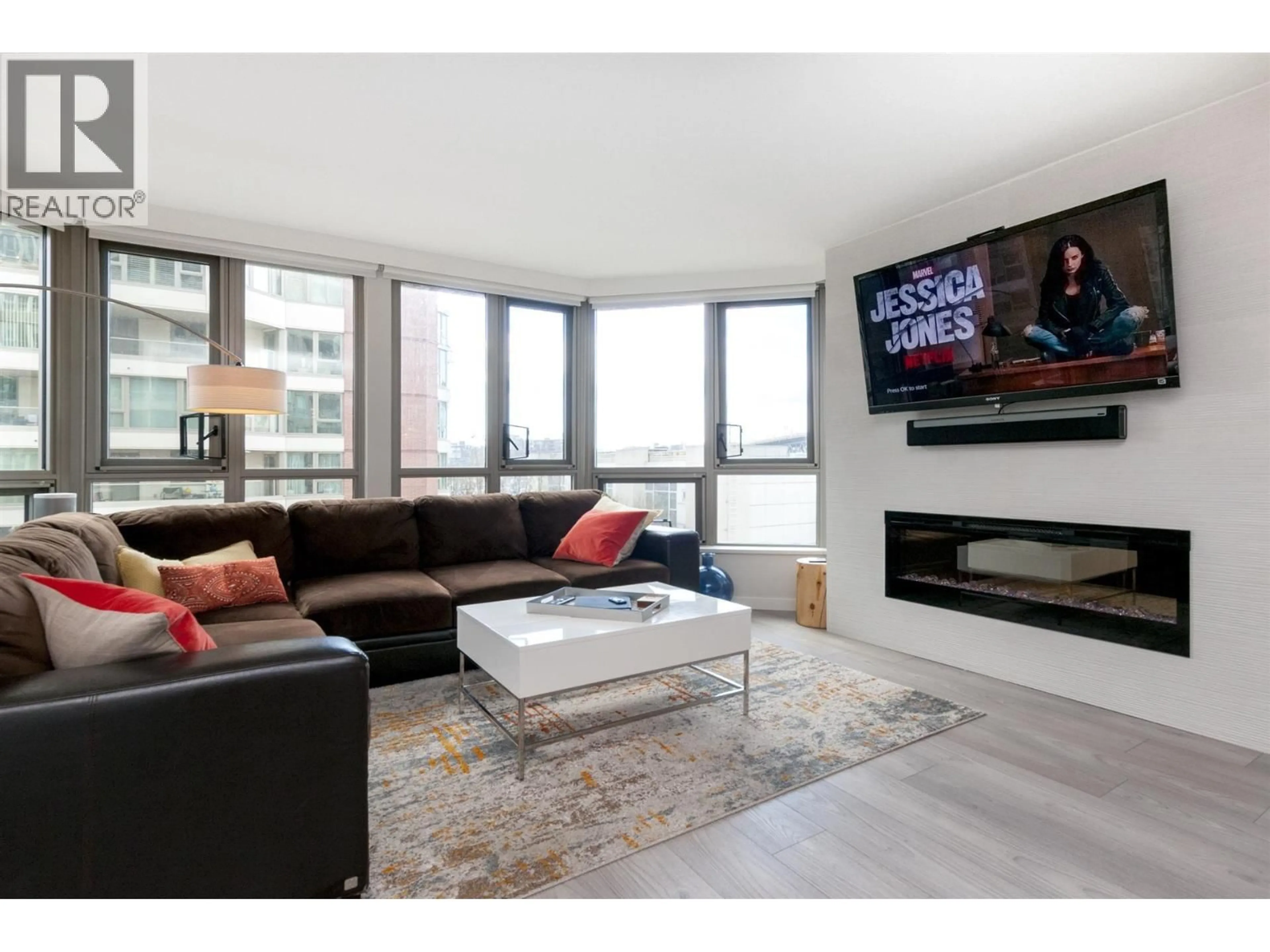 Living room with furniture, wood/laminate floor for 303 - 1625 HORNBY STREET, Vancouver British Columbia V6Z2M2