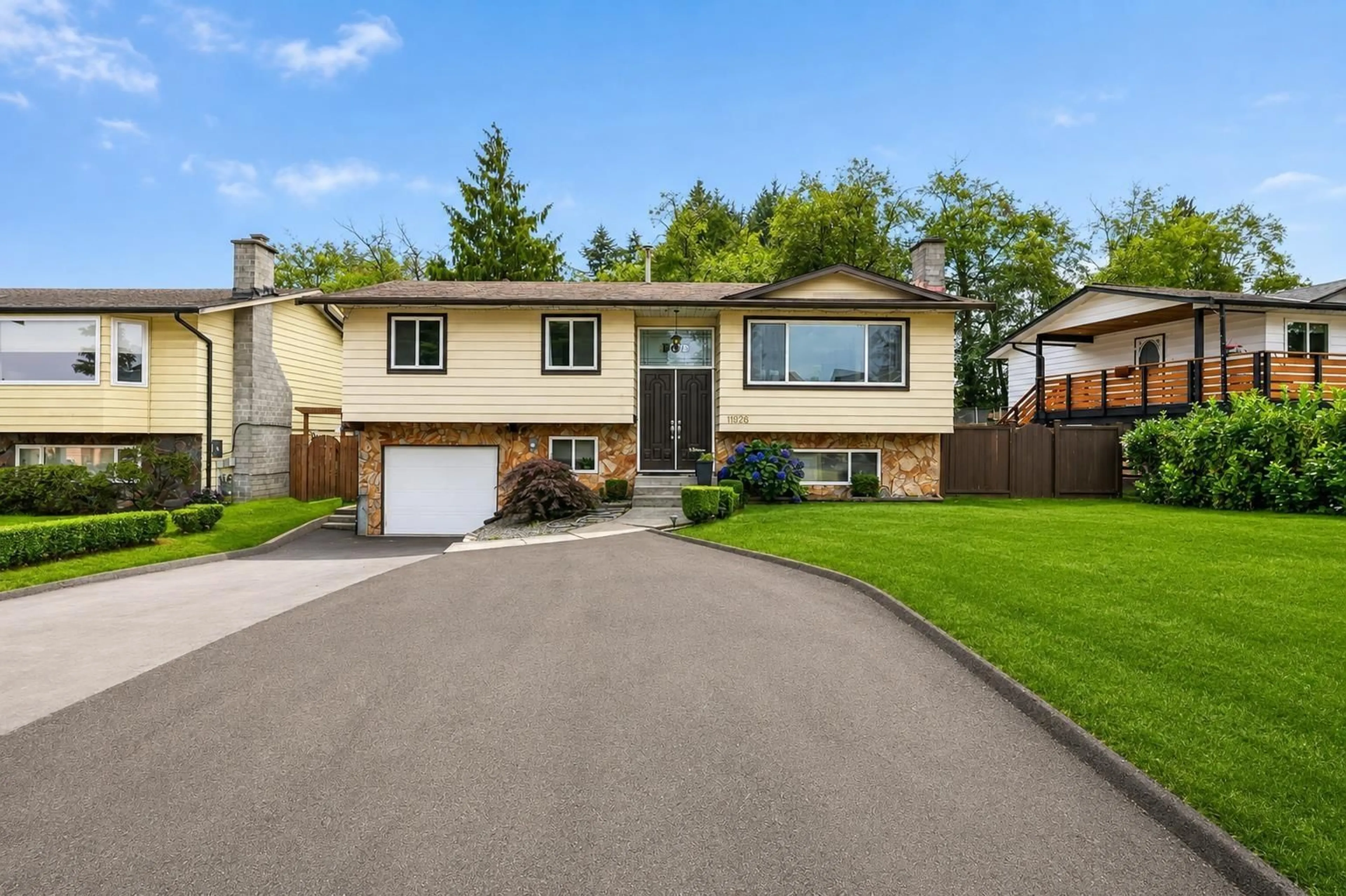 Home with vinyl exterior material, street for 11926 77A AVENUE, Surrey British Columbia V4C7K1
