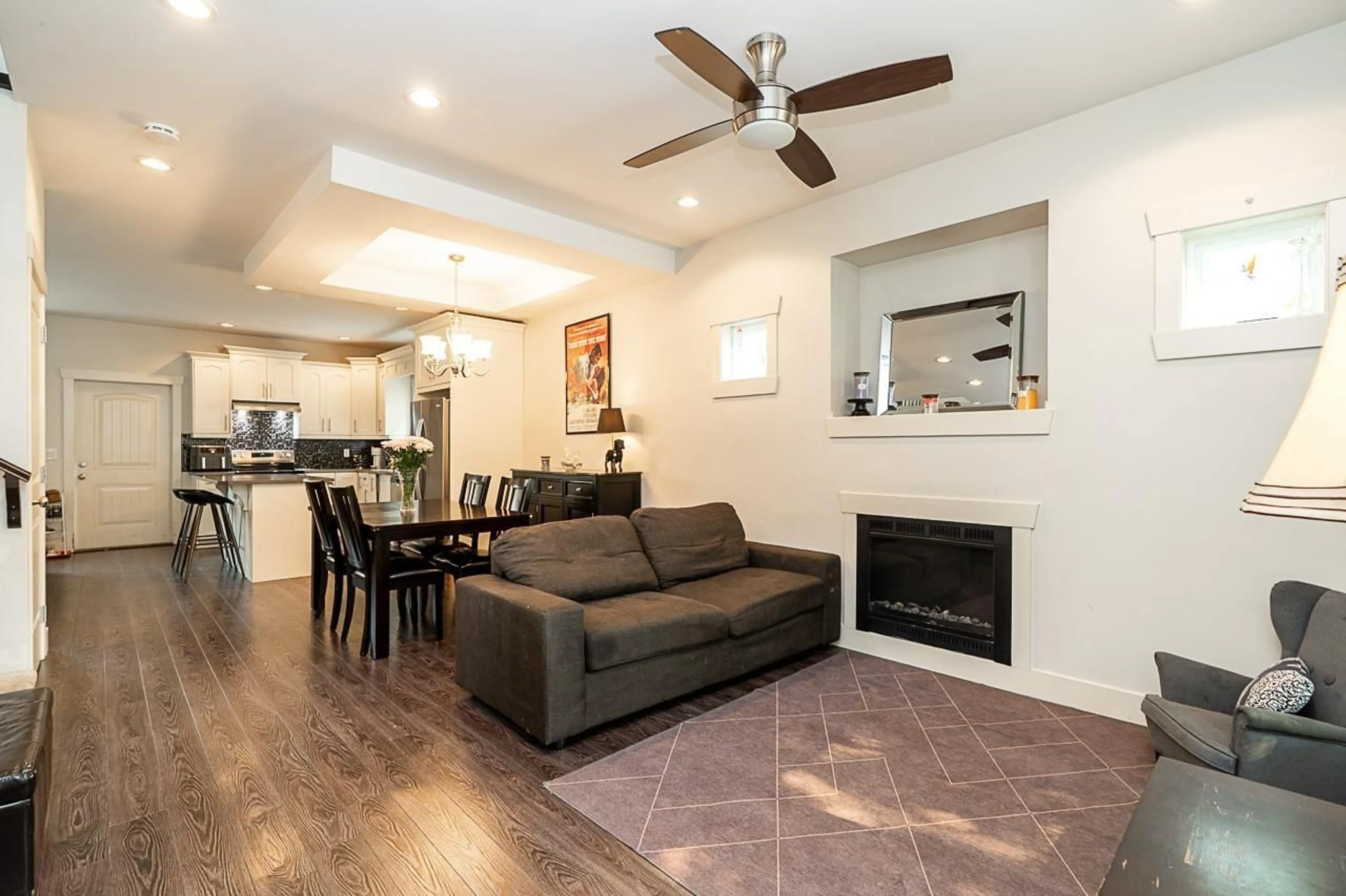 Living room with furniture, wood/laminate floor for 2934 STATION ROAD, Abbotsford British Columbia V4X0A5