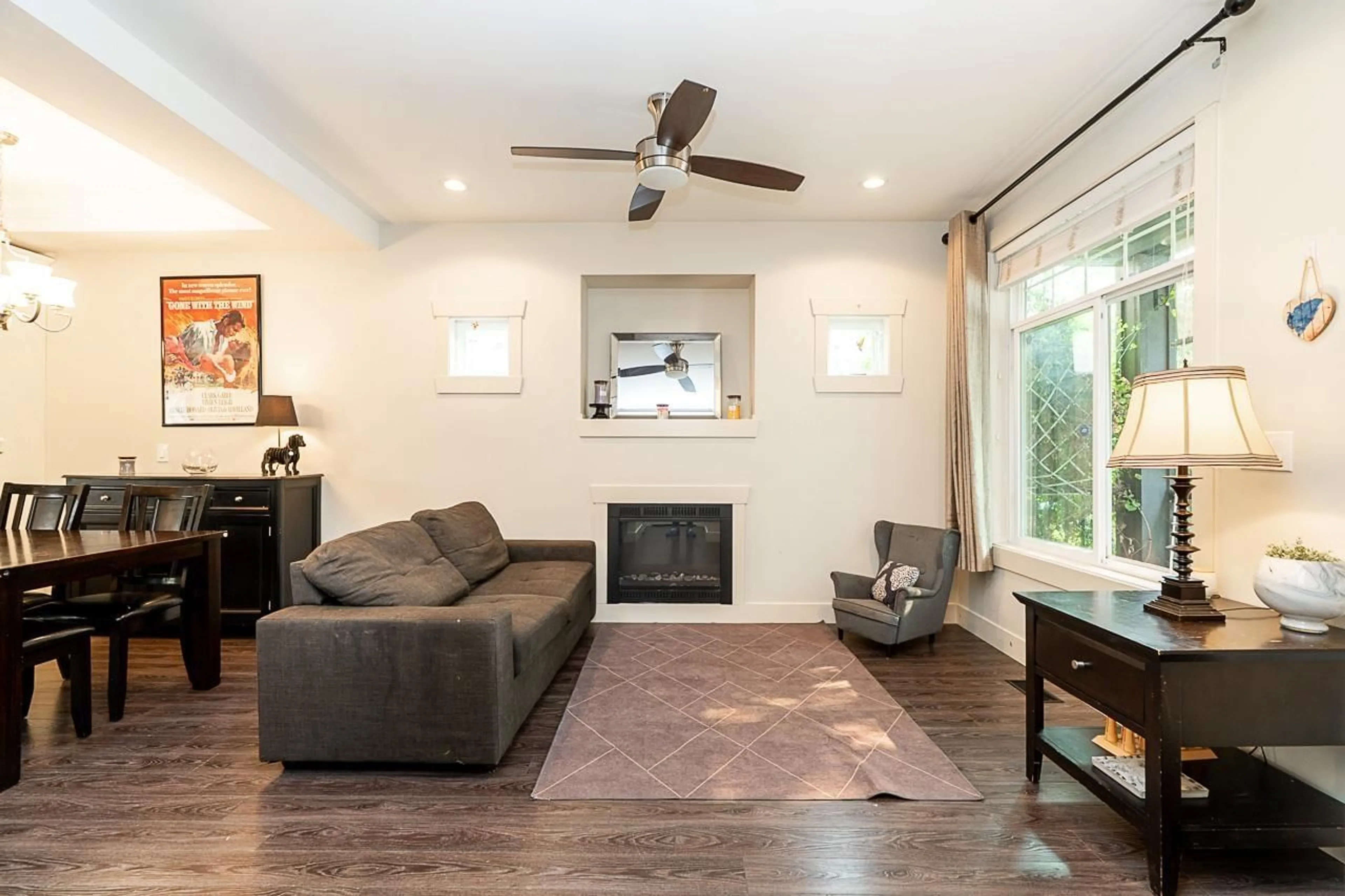 Living room with furniture, wood/laminate floor for 2934 STATION ROAD, Abbotsford British Columbia V4X0A5