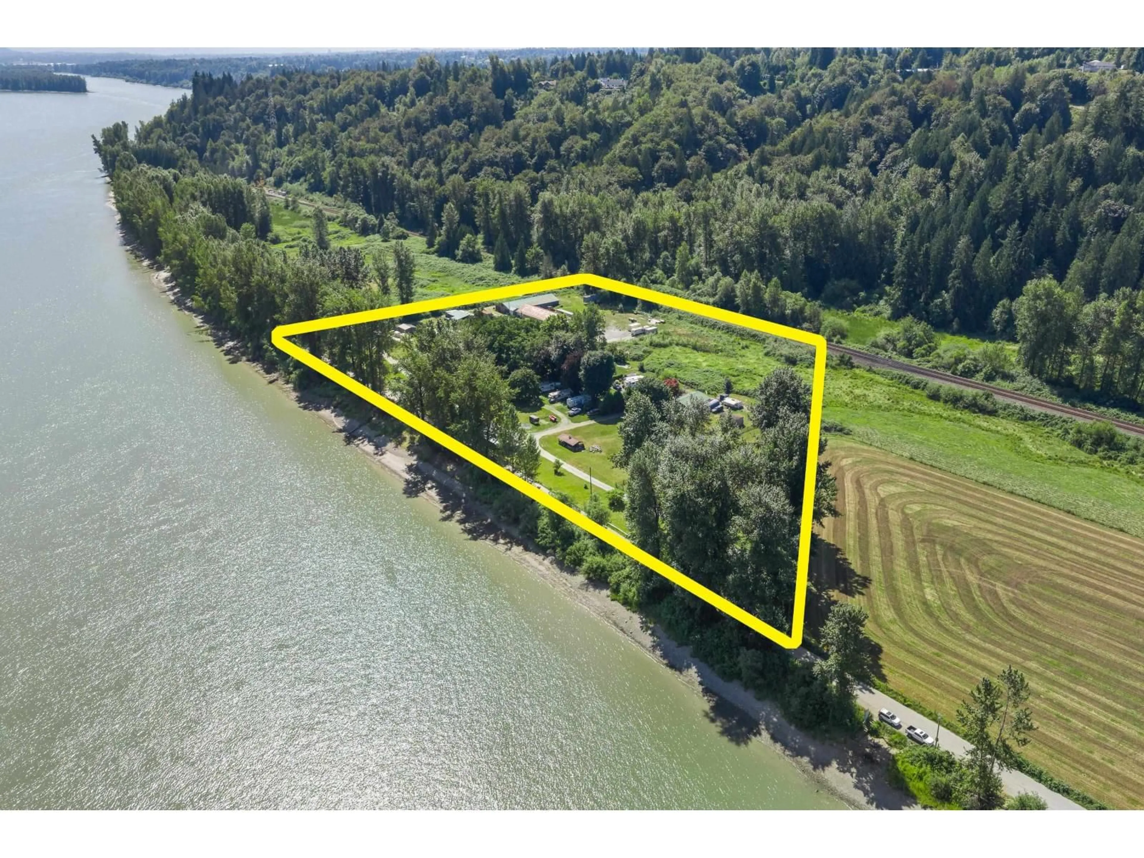 A pic from outside/outdoor area/front of a property/back of a property/a pic from drone, water/lake/river/ocean view for 29464 RIVER ROAD, Abbotsford British Columbia V4X2H2