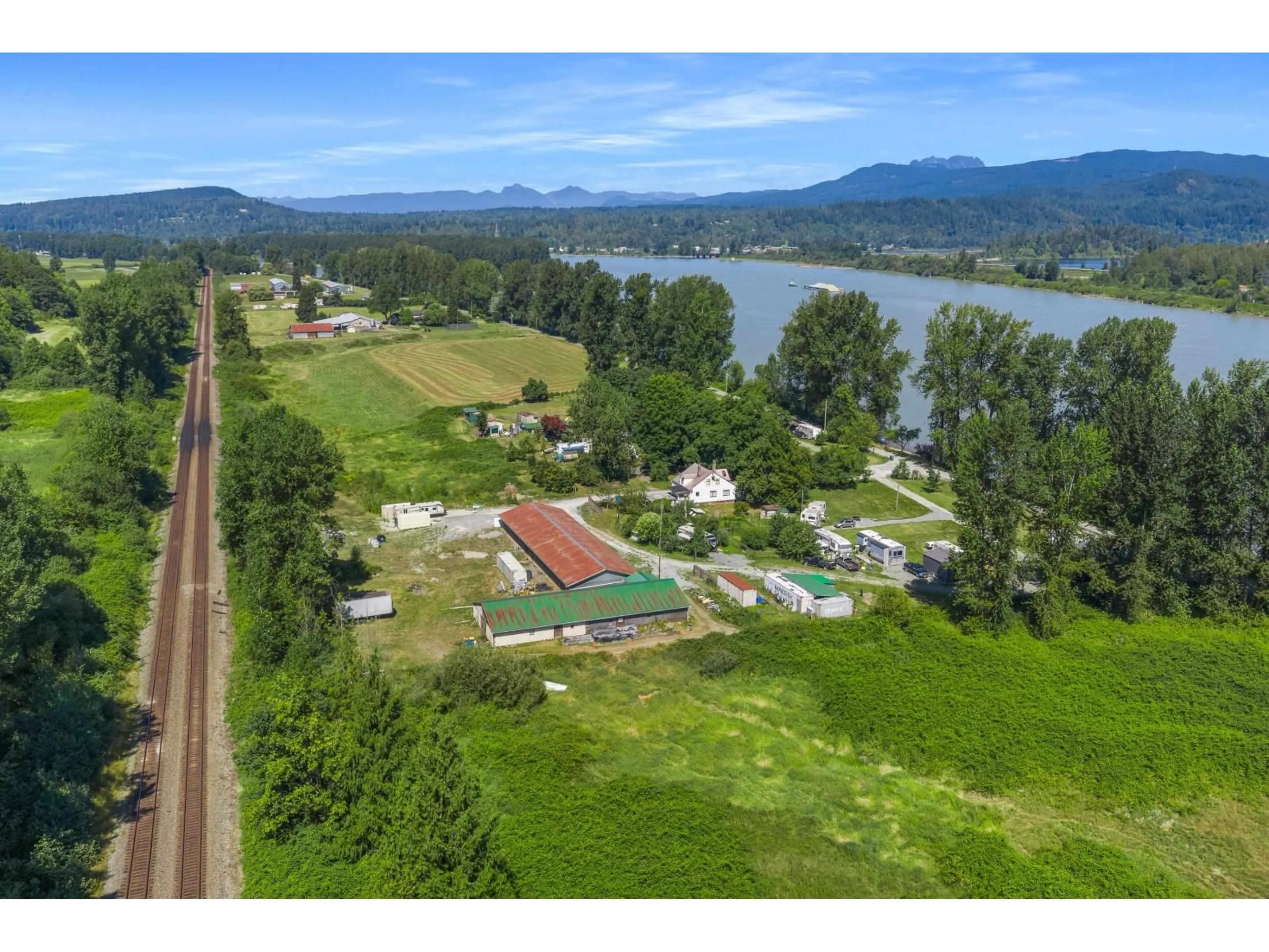 A pic from outside/outdoor area/front of a property/back of a property/a pic from drone, water/lake/river/ocean view for 29464 RIVER ROAD, Abbotsford British Columbia V4X2H2