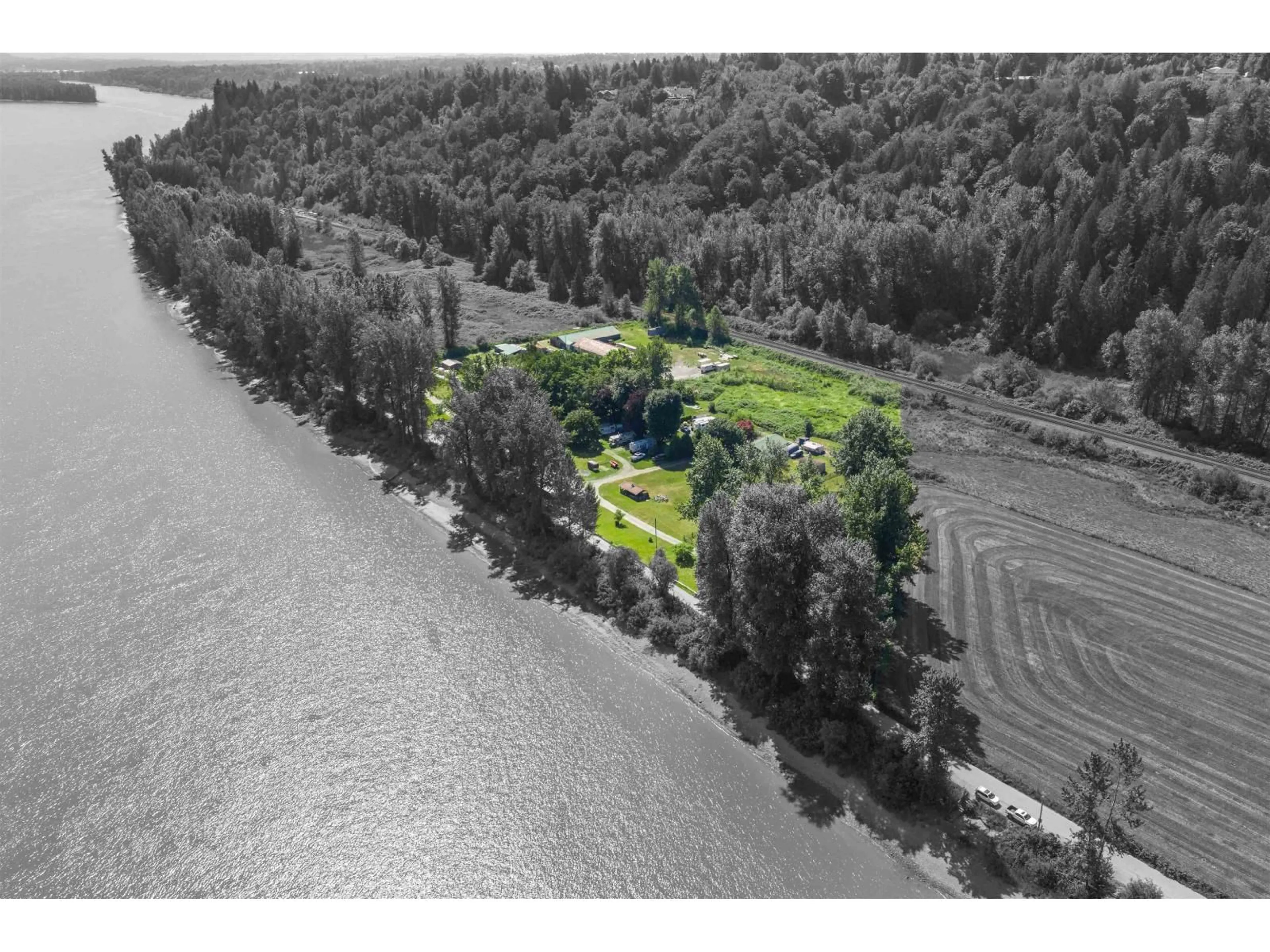A pic from outside/outdoor area/front of a property/back of a property/a pic from drone, water/lake/river/ocean view for 29464 RIVER ROAD, Abbotsford British Columbia V4X2H2