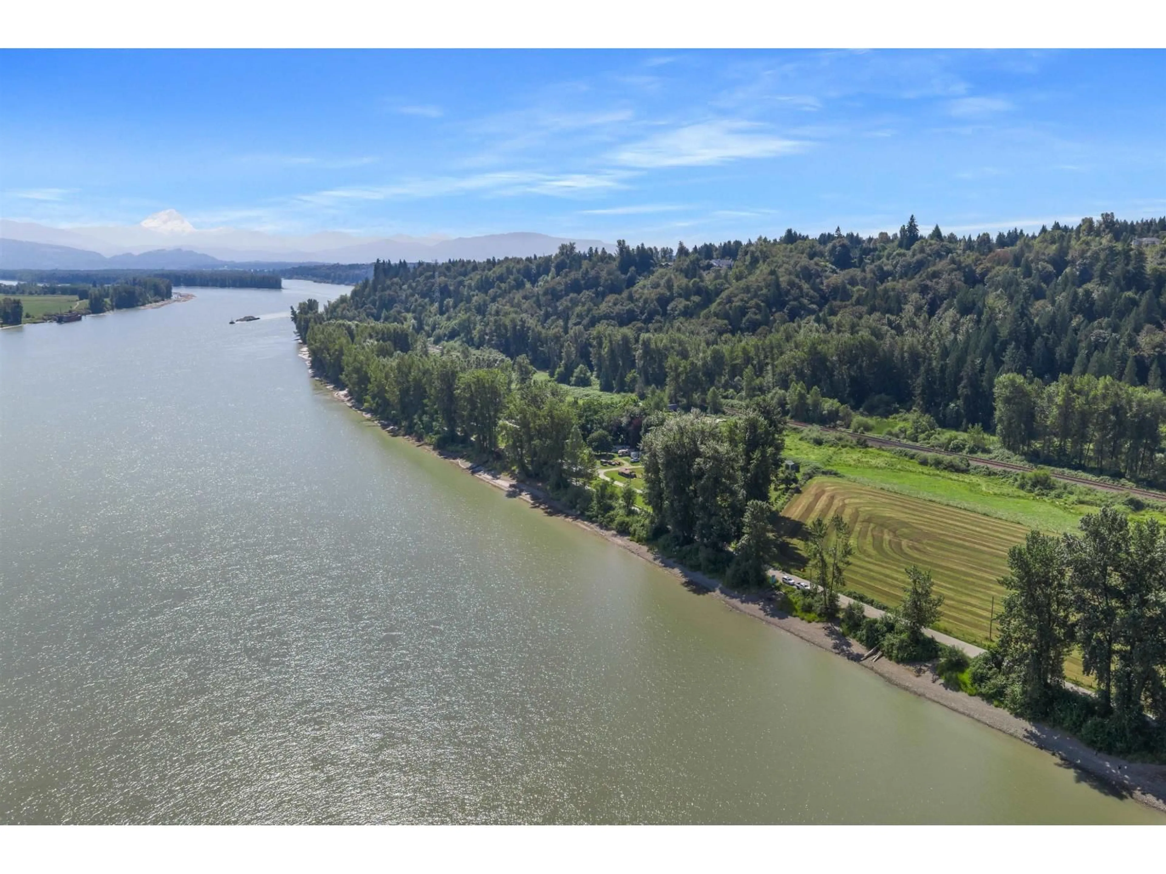 A pic from outside/outdoor area/front of a property/back of a property/a pic from drone, water/lake/river/ocean view for 29464 RIVER ROAD, Abbotsford British Columbia V4X2H2