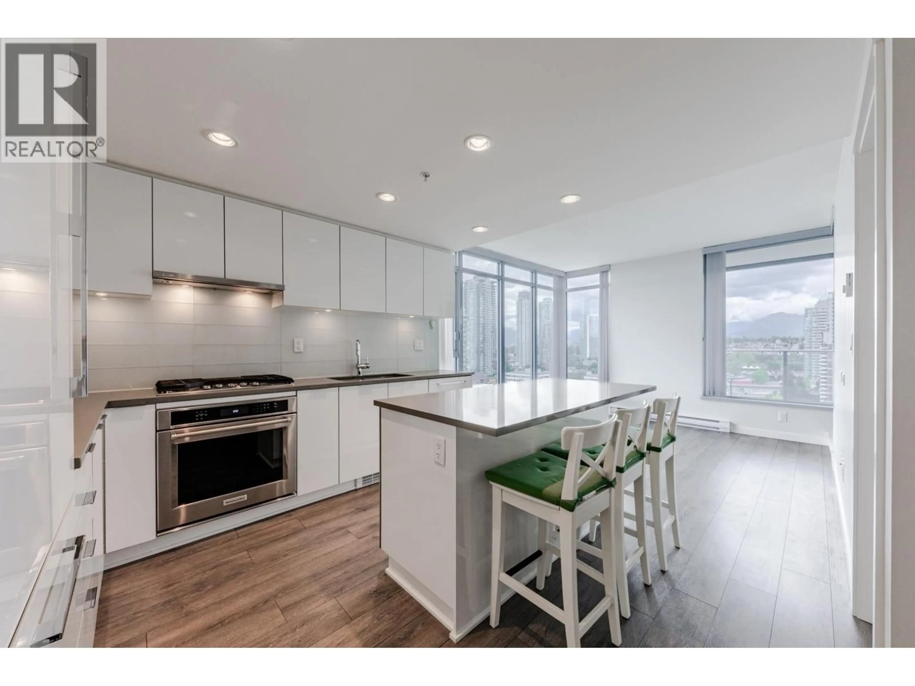 Open concept kitchen, wood/laminate floor for 2006 - 2388 MADISON AVENUE, Burnaby British Columbia V5C0K8