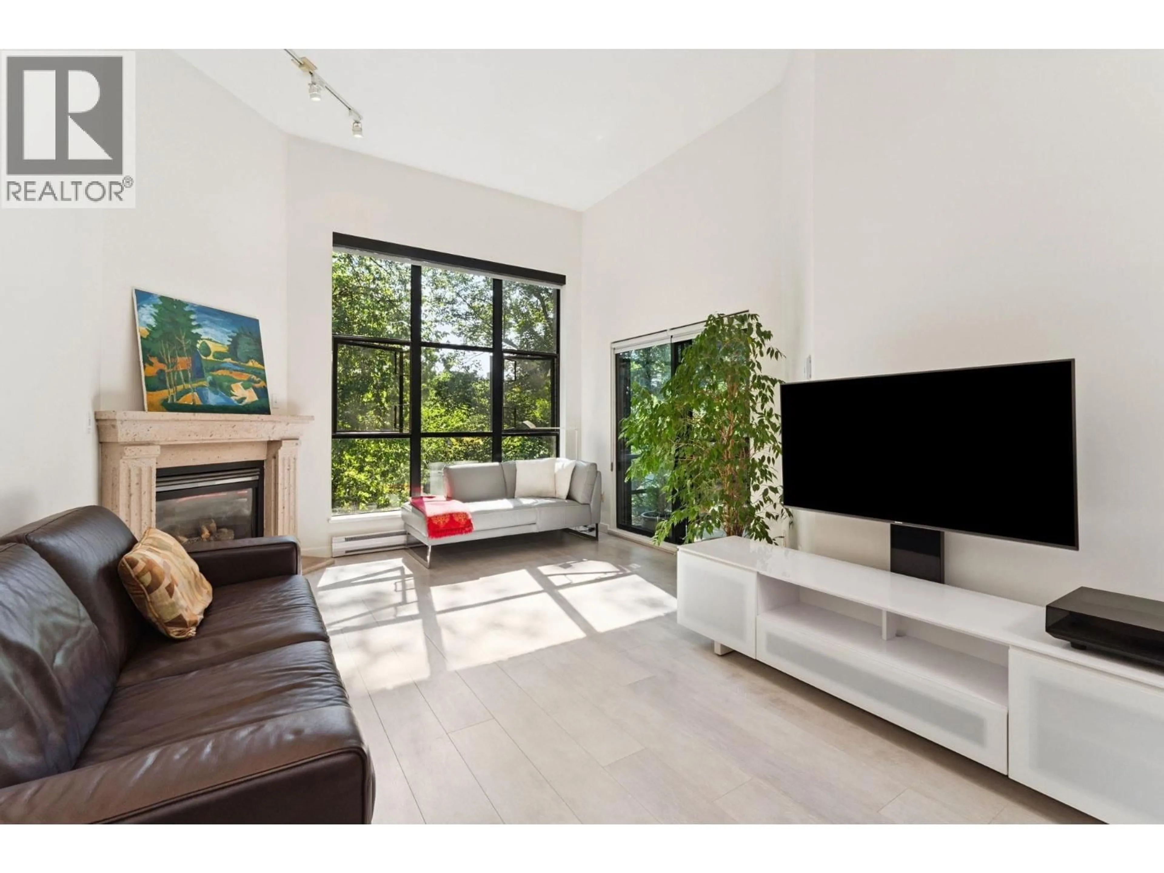 Living room with furniture, unknown for 411 - 2181 10TH AVENUE, Vancouver British Columbia V6K2H7