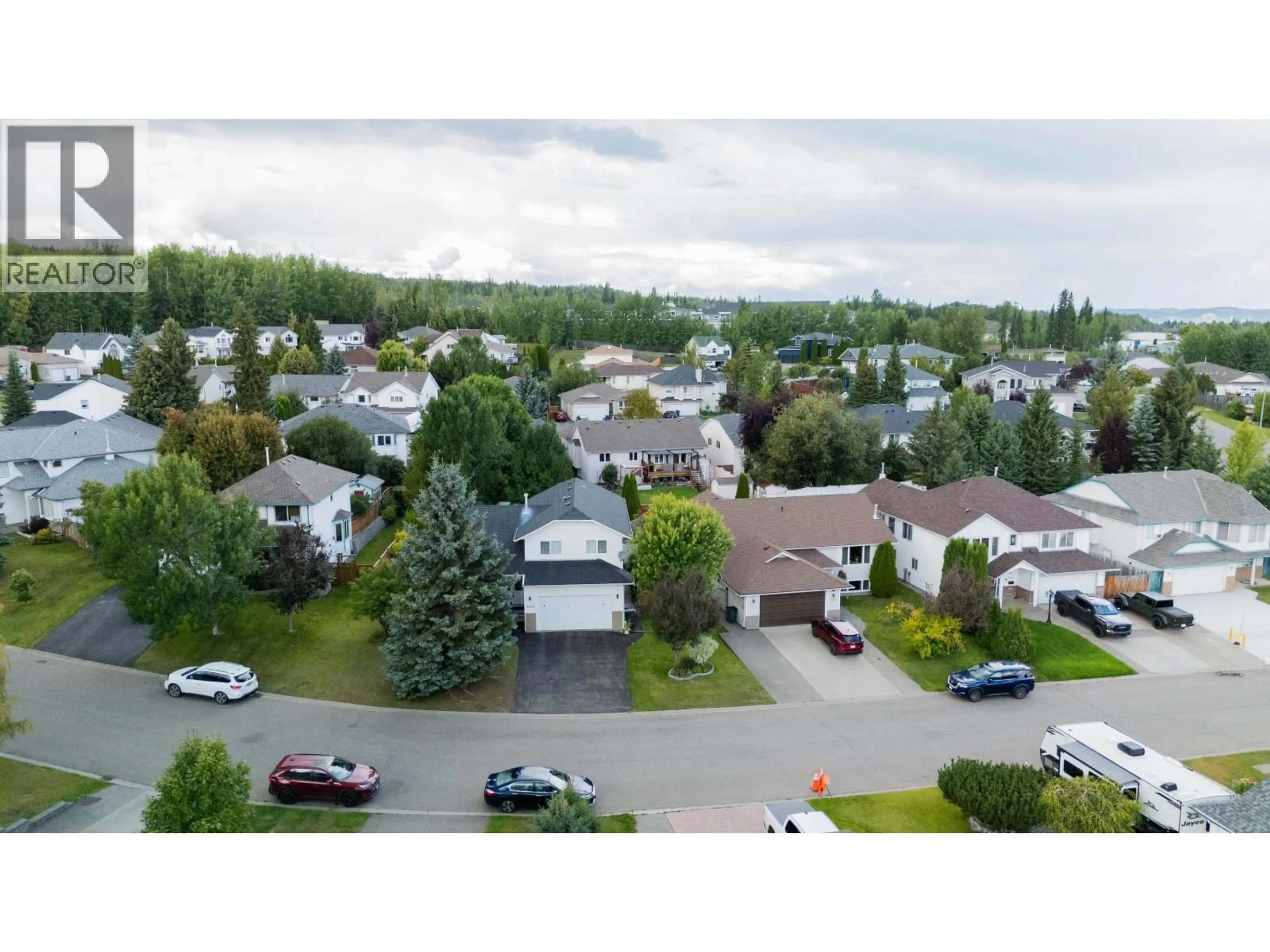 A pic from outside/outdoor area/front of a property/back of a property/a pic from drone, mountain view for 3228 ST FRANCES CRESCENT, Prince George British Columbia V2N4Y9