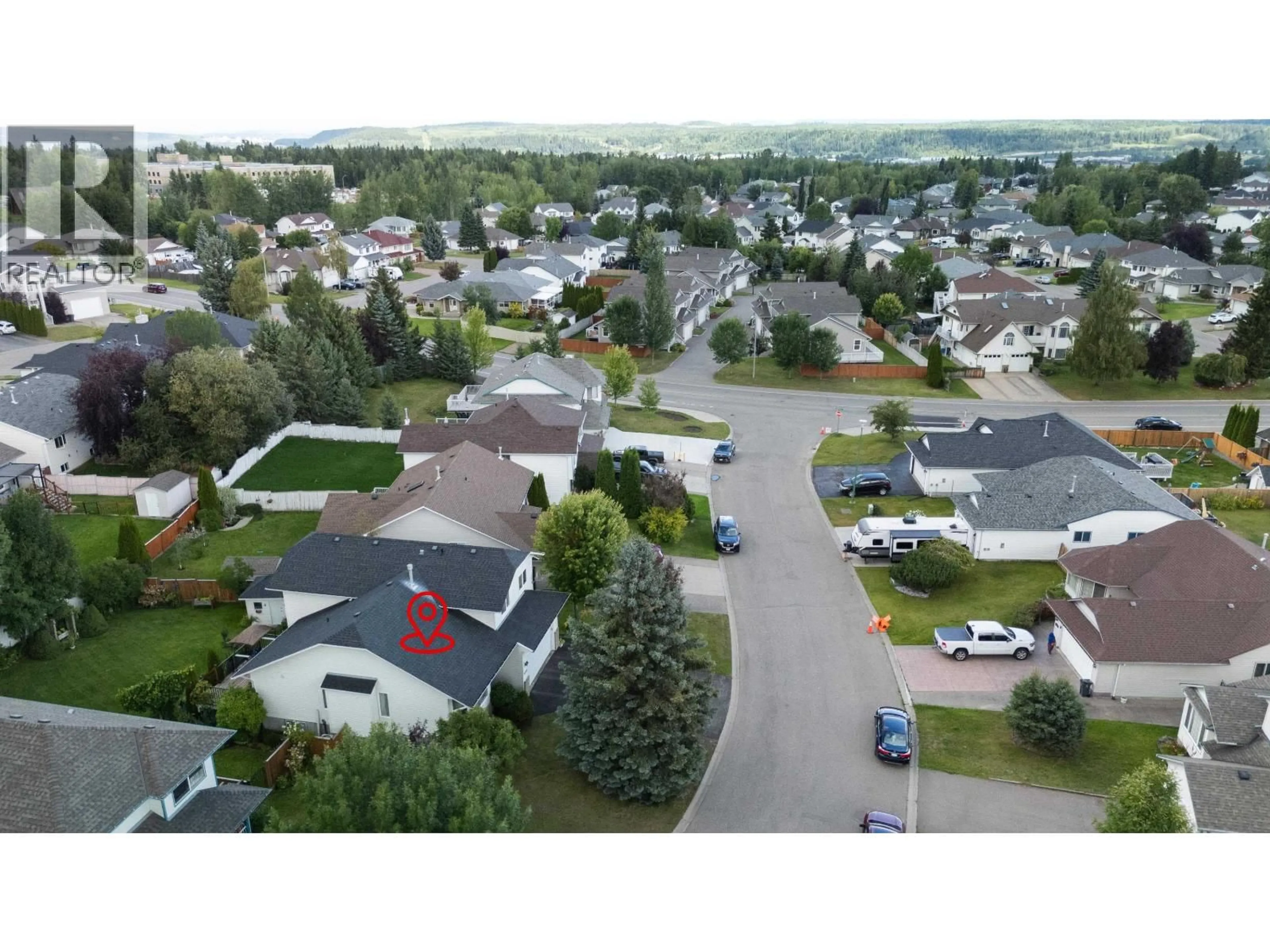 A pic from outside/outdoor area/front of a property/back of a property/a pic from drone, street for 3228 ST FRANCES CRESCENT, Prince George British Columbia V2N4Y9
