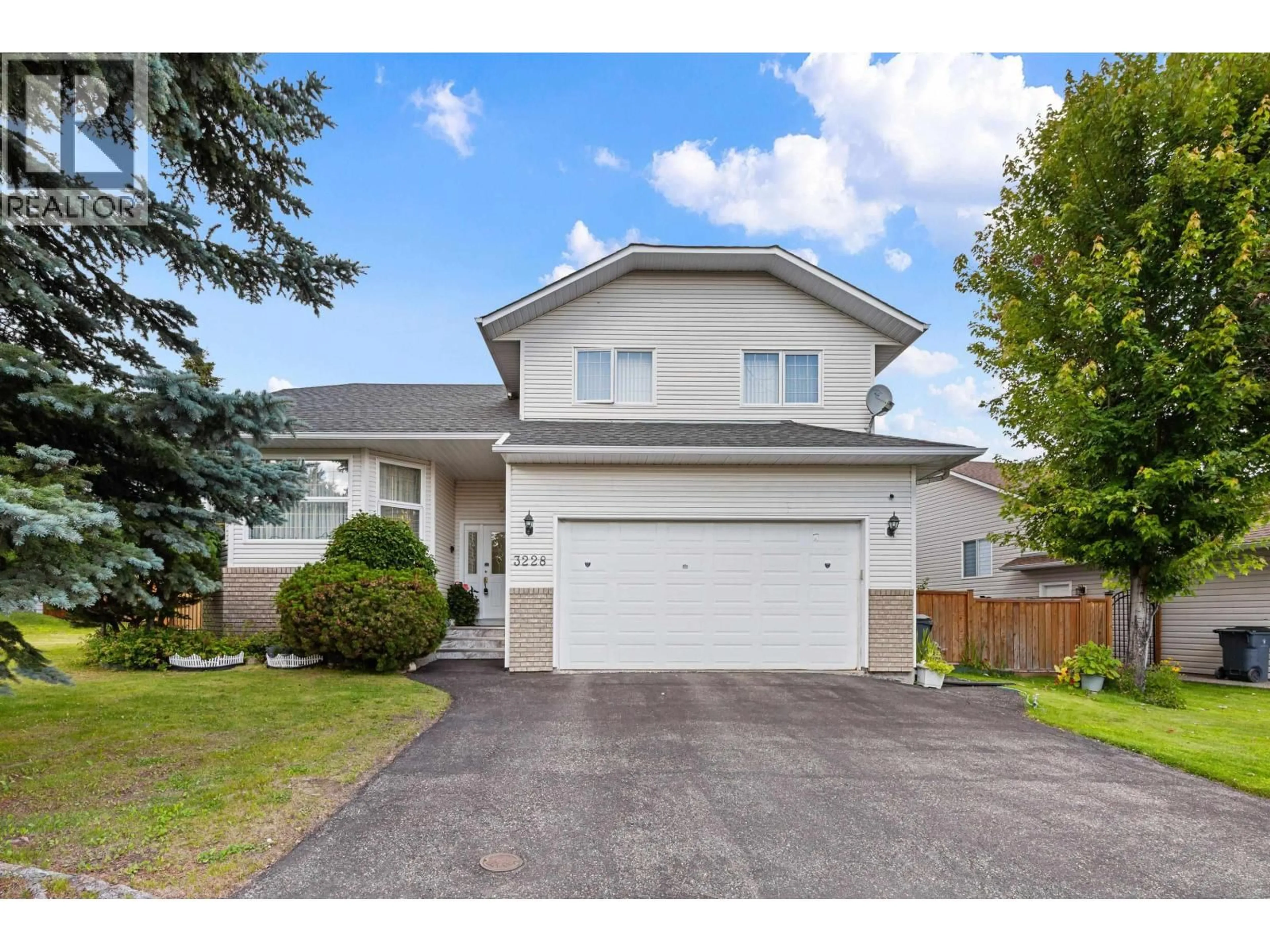 Home with vinyl exterior material, street for 3228 ST FRANCES CRESCENT, Prince George British Columbia V2N5A3