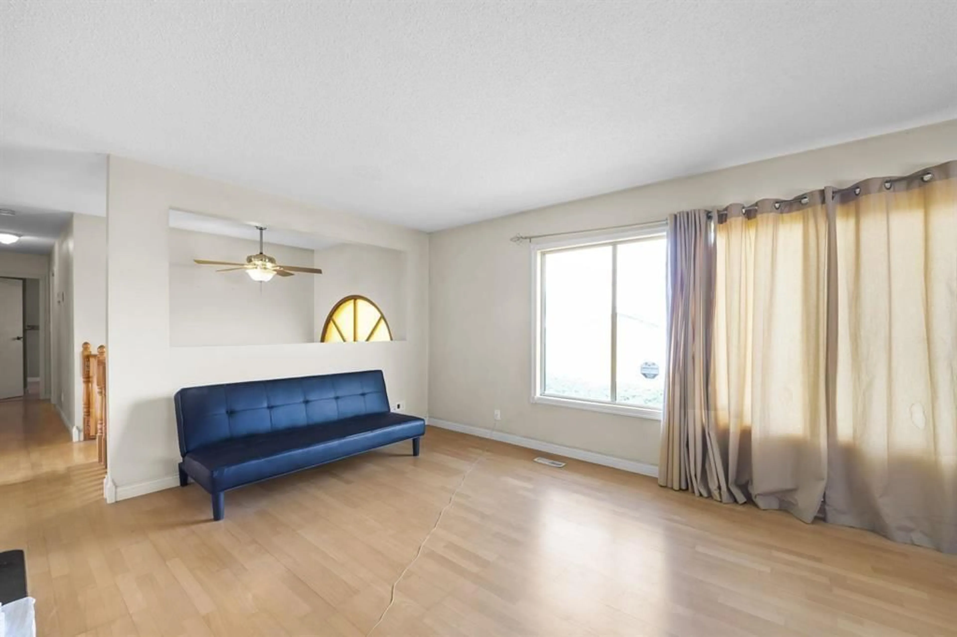 Living room with furniture, wood/laminate floor for 41588 YARROW CENTRAL ROAD, Yarrow British Columbia V2R5G4