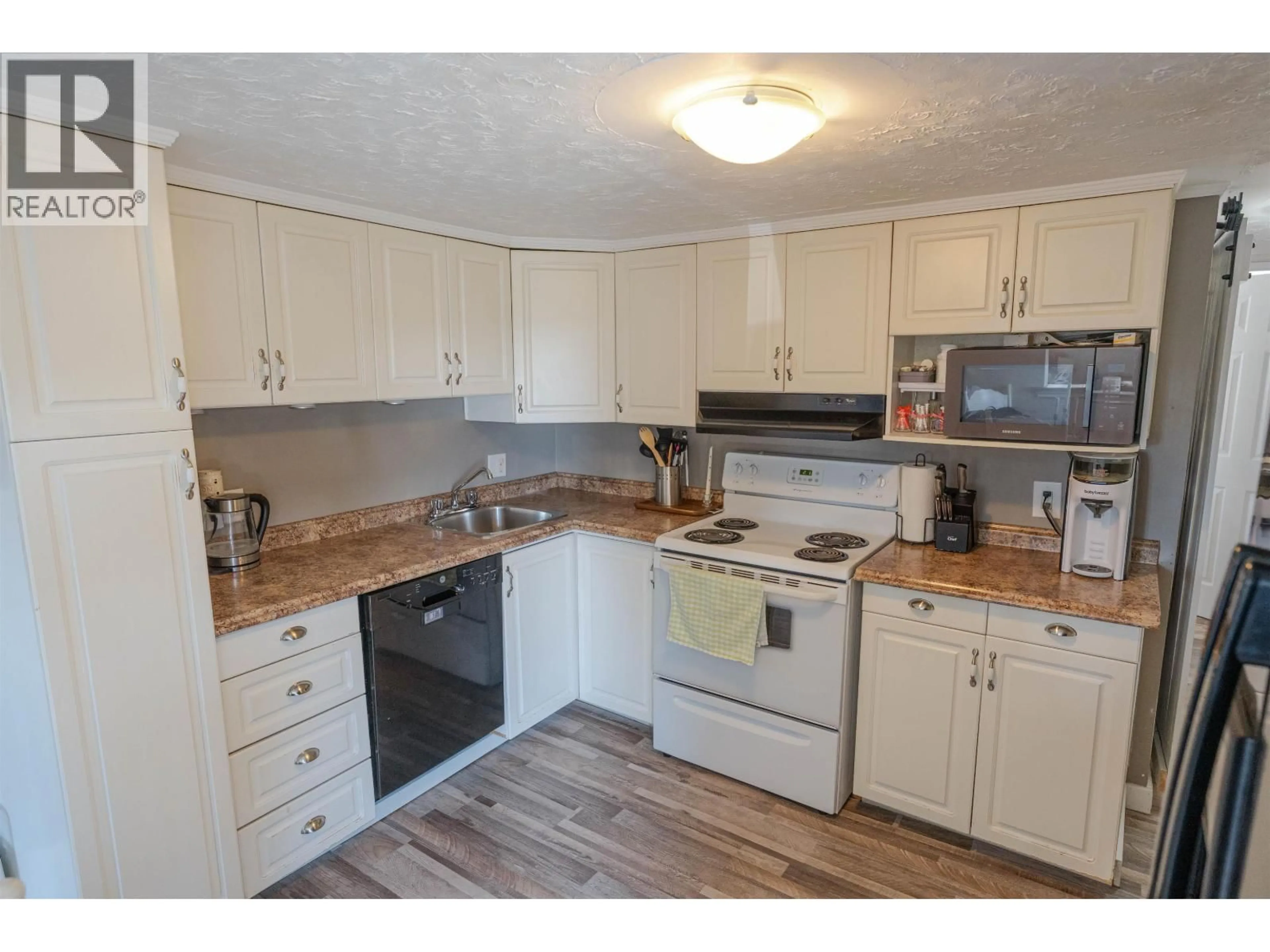 Standard kitchen, wood/laminate floor for 126 - 8420 ALASKA ROAD, Fort St. John British Columbia V1J4J6