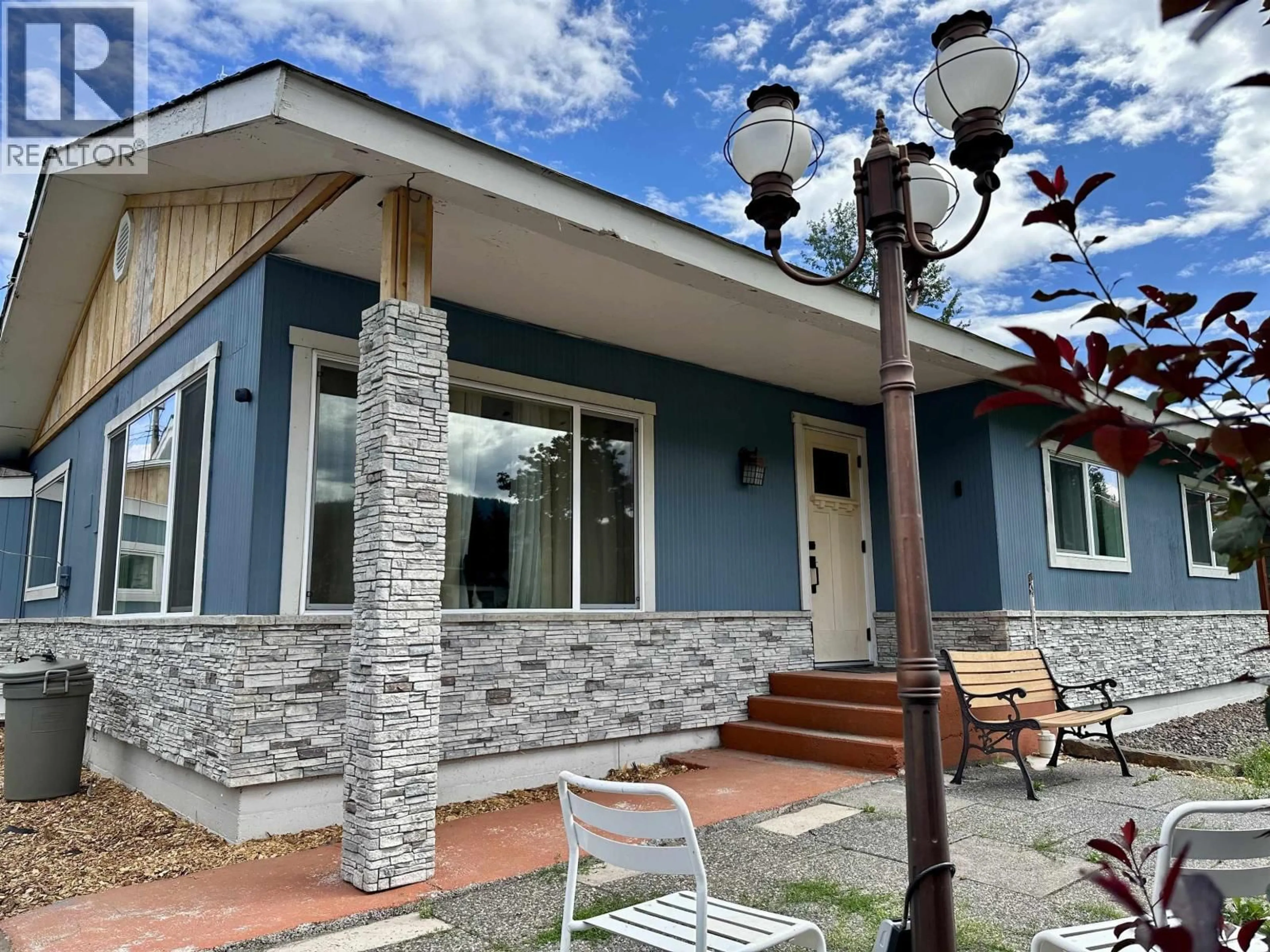 Home with brick exterior material, unknown for 3672 BROADWAY AVENUE, Smithers British Columbia V0J2N0
