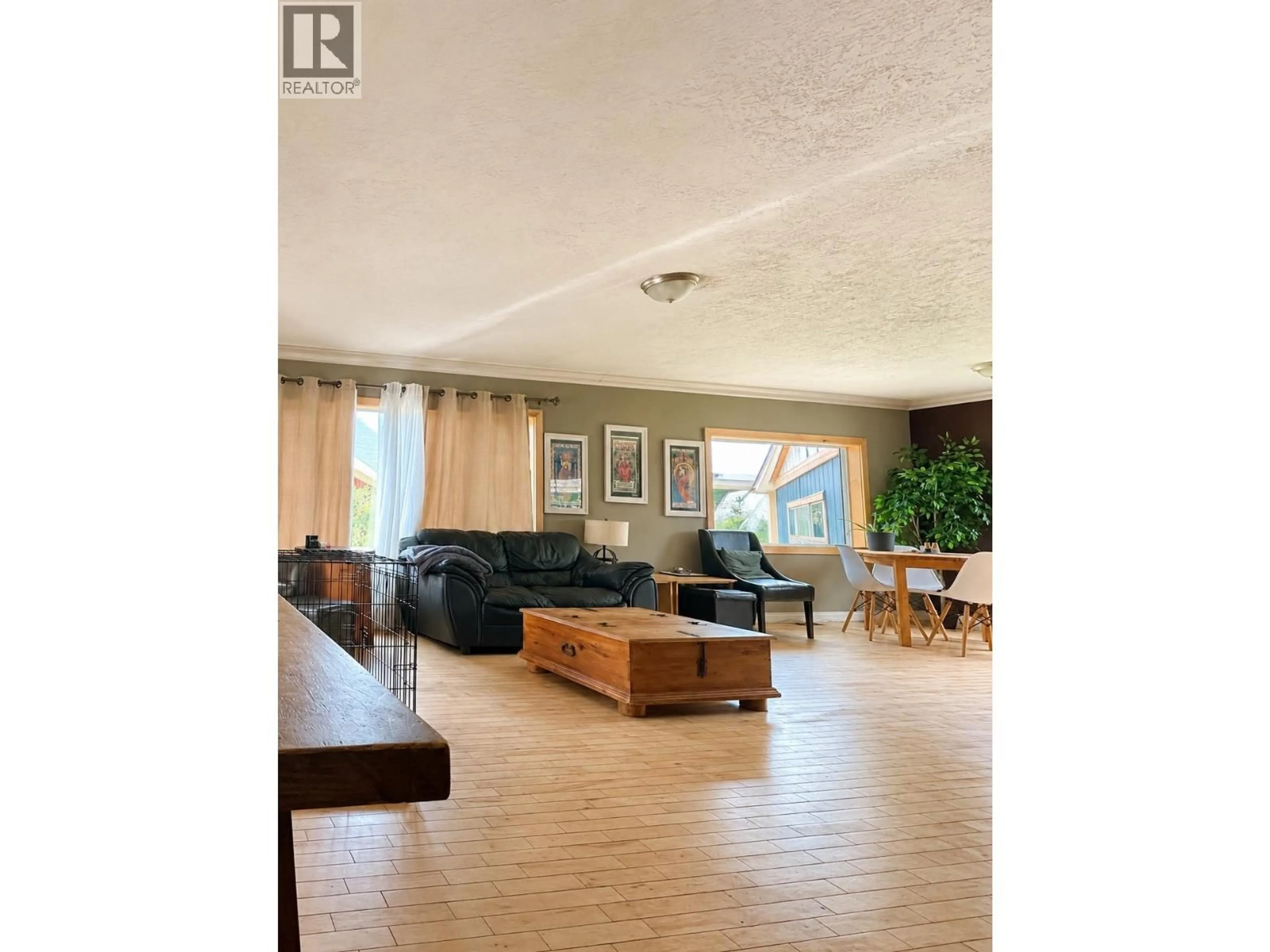 Living room with furniture, wood/laminate floor for 3672 BROADWAY AVENUE, Smithers British Columbia V0J2N0