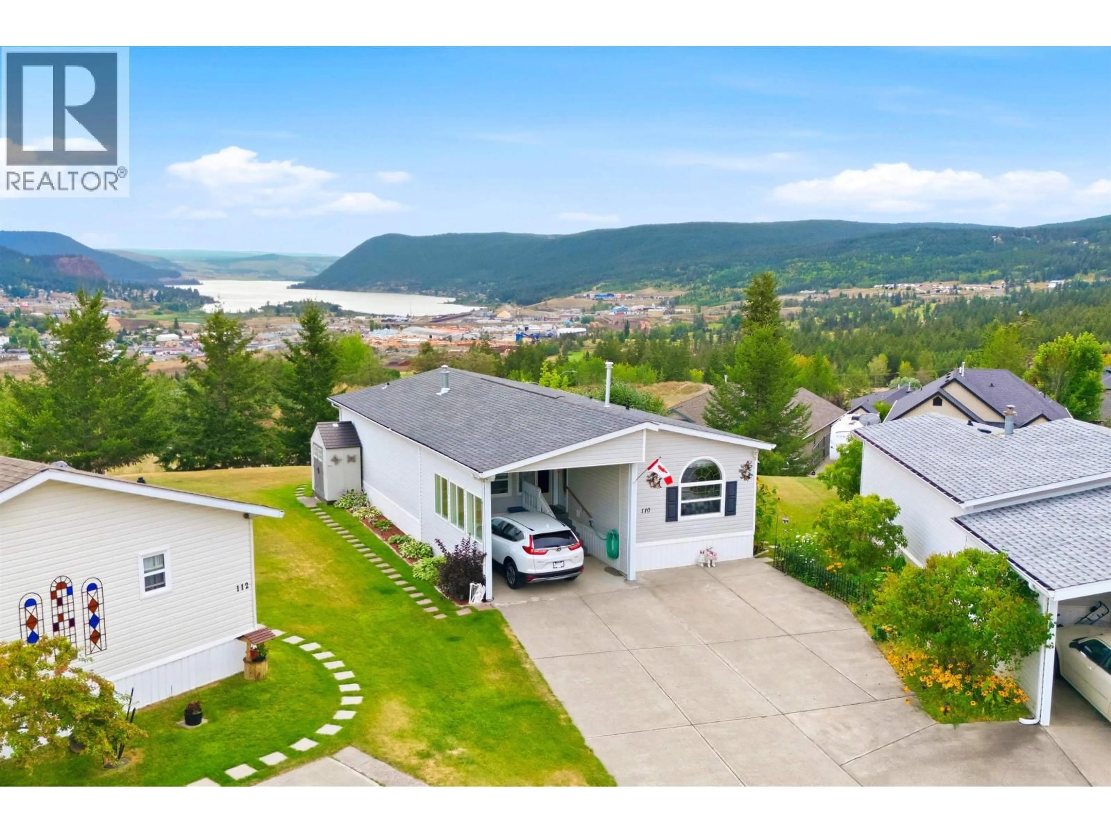 A pic from outside/outdoor area/front of a property/back of a property/a pic from drone, mountain view for 110 - 375 MANDARINO PLACE, Williams Lake British Columbia V2G4V3