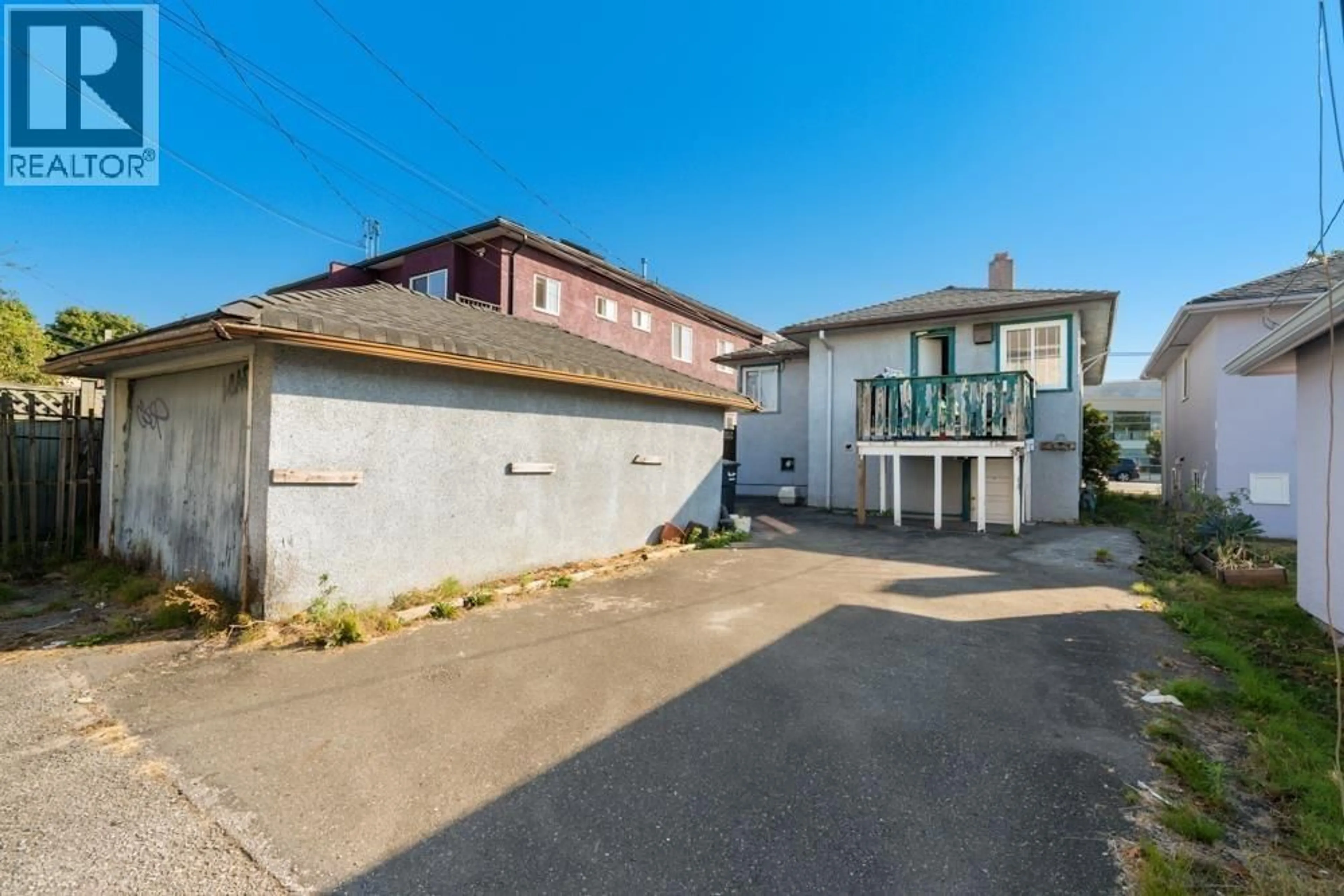A pic from outside/outdoor area/front of a property/back of a property/a pic from drone, street for 6779 MAIN STREET, Vancouver British Columbia V5X3H4