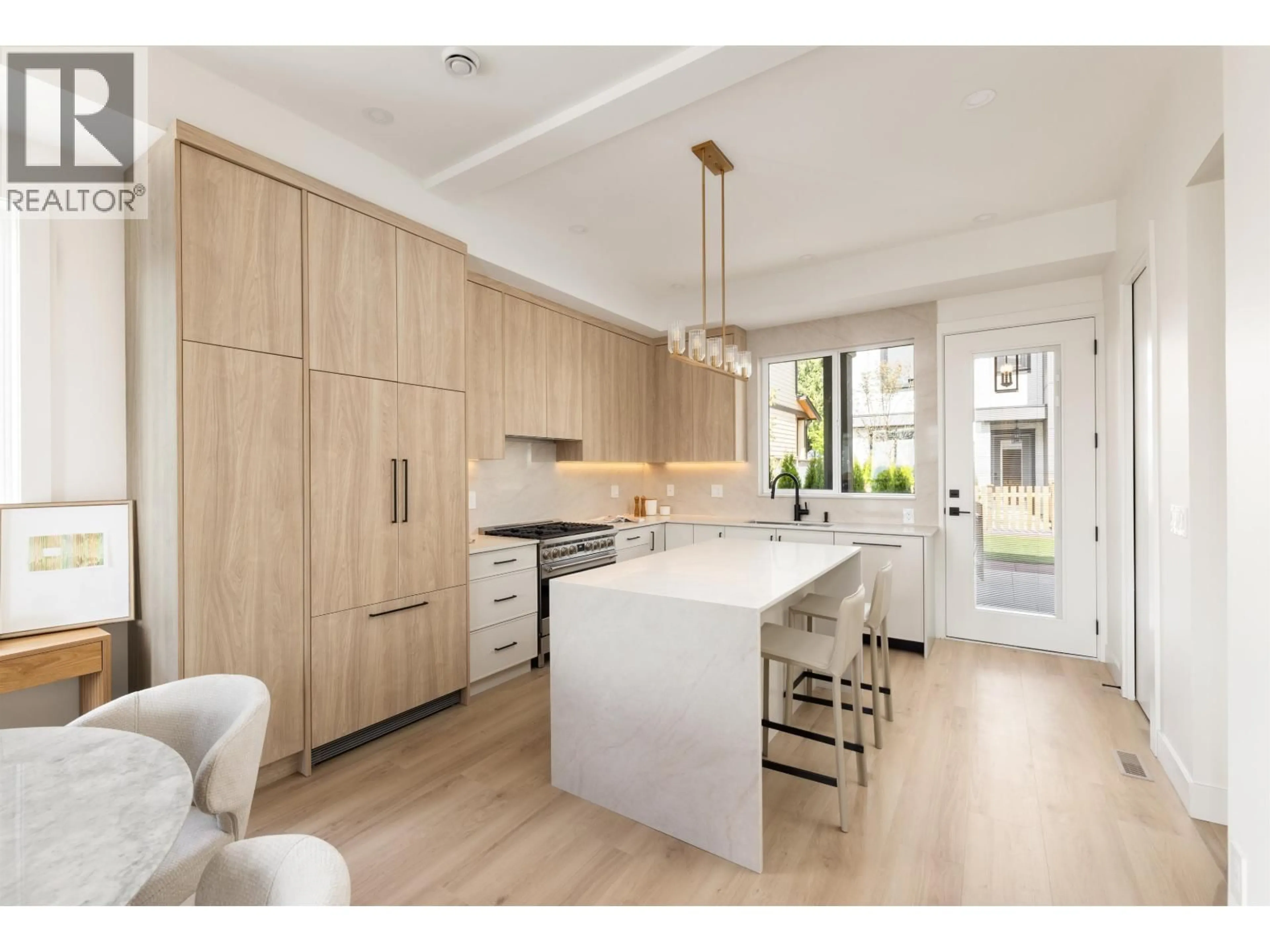Open concept kitchen, wood/laminate floor for 102 - 753 EDGAR AVENUE, Coquitlam British Columbia V3K2J3