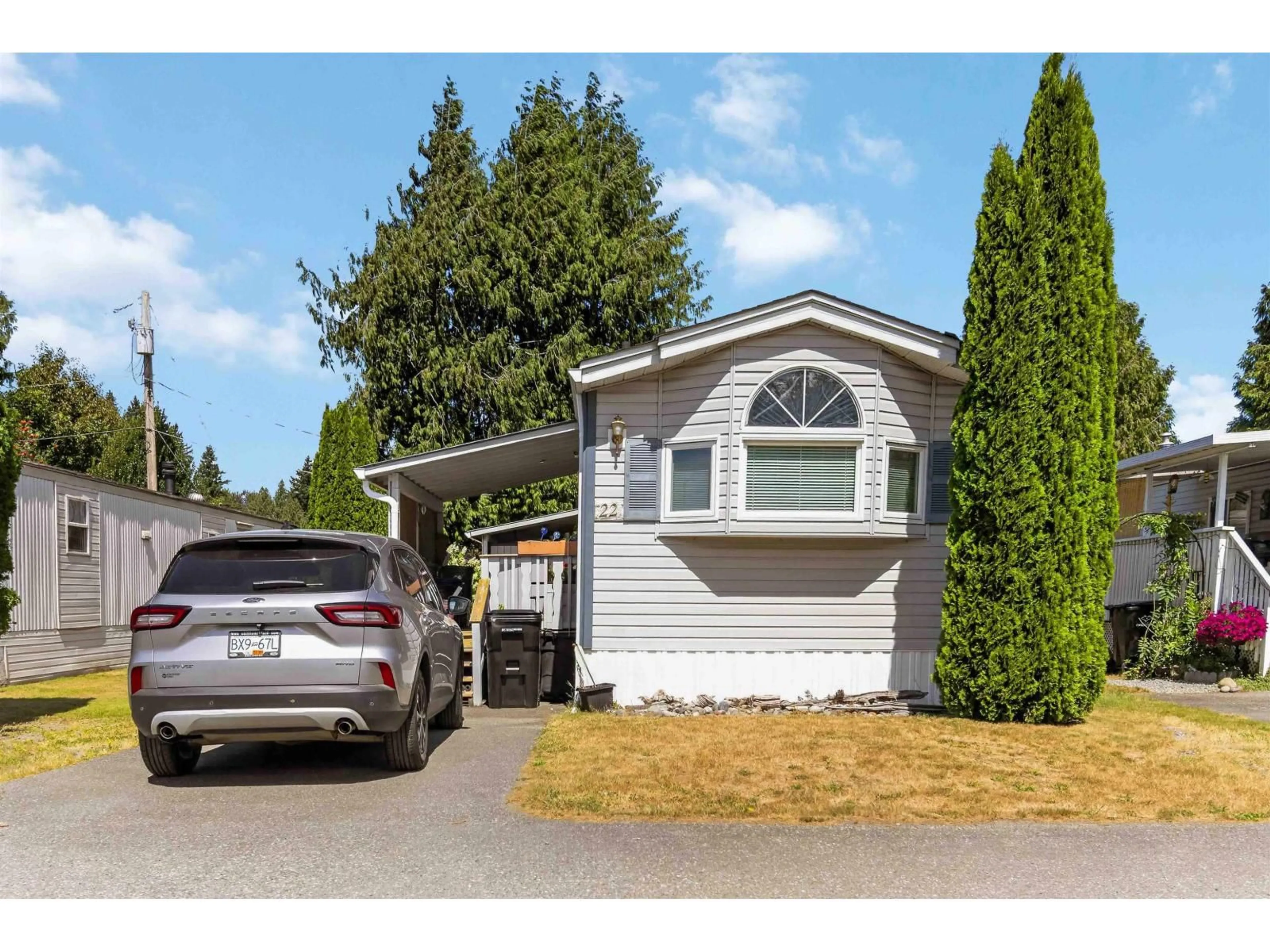 Home with vinyl exterior material, street for 22 - 44565 MONTE VISTA DRIVE, Chilliwack British Columbia V2R5Y4