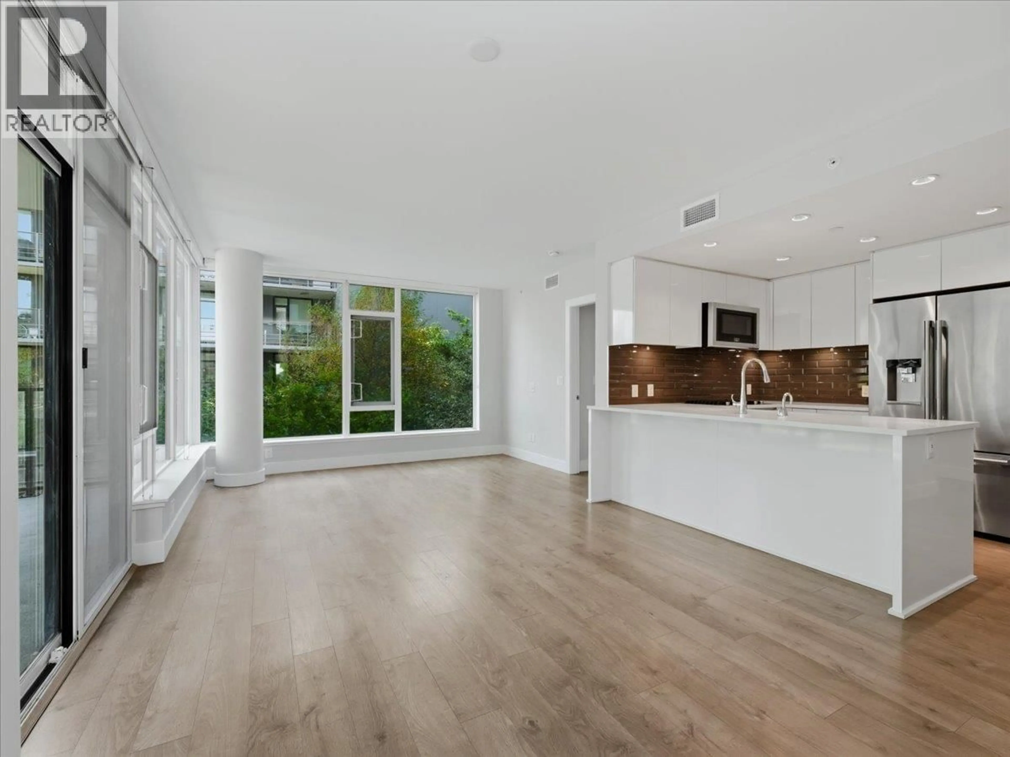 Open concept kitchen, unknown for 302 - 8533 RIVER DISTRICT CROSSING, Vancouver British Columbia V5S0C8