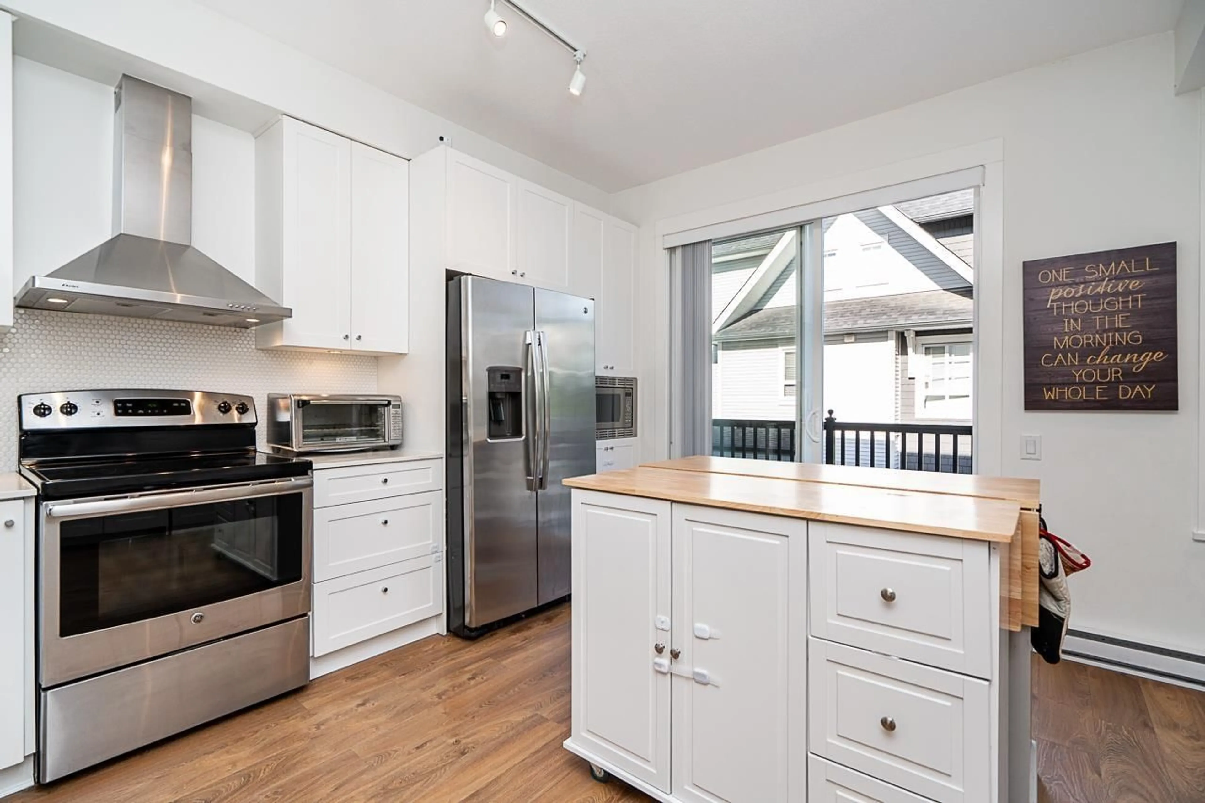 Open concept kitchen, wood/laminate floor for 3 - 8476 207A STREET, Langley British Columbia V2Y0S6