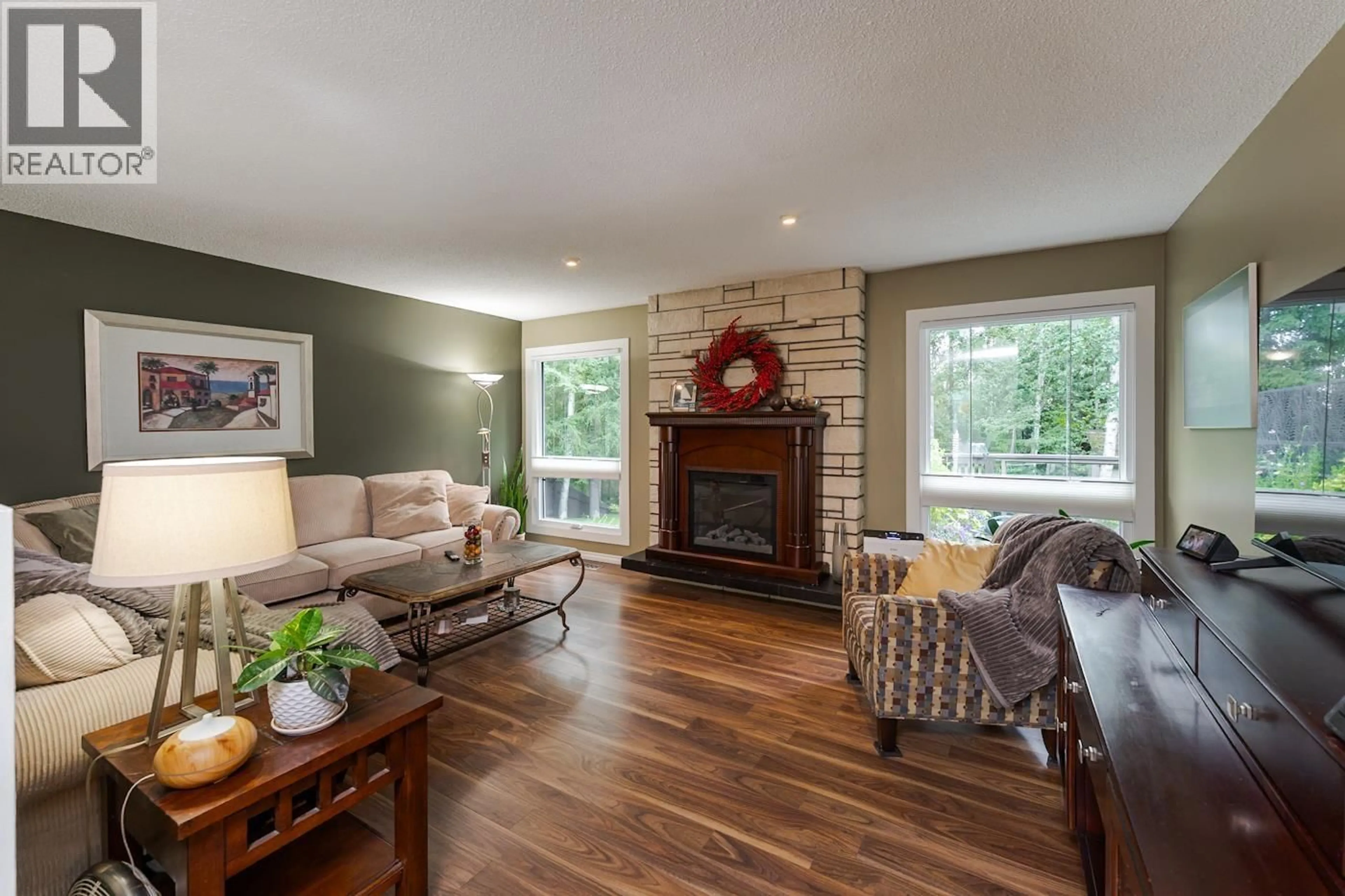 Living room with furniture, wood/laminate floor for 5836 TRENT DRIVE, Prince George British Columbia V2N2E9