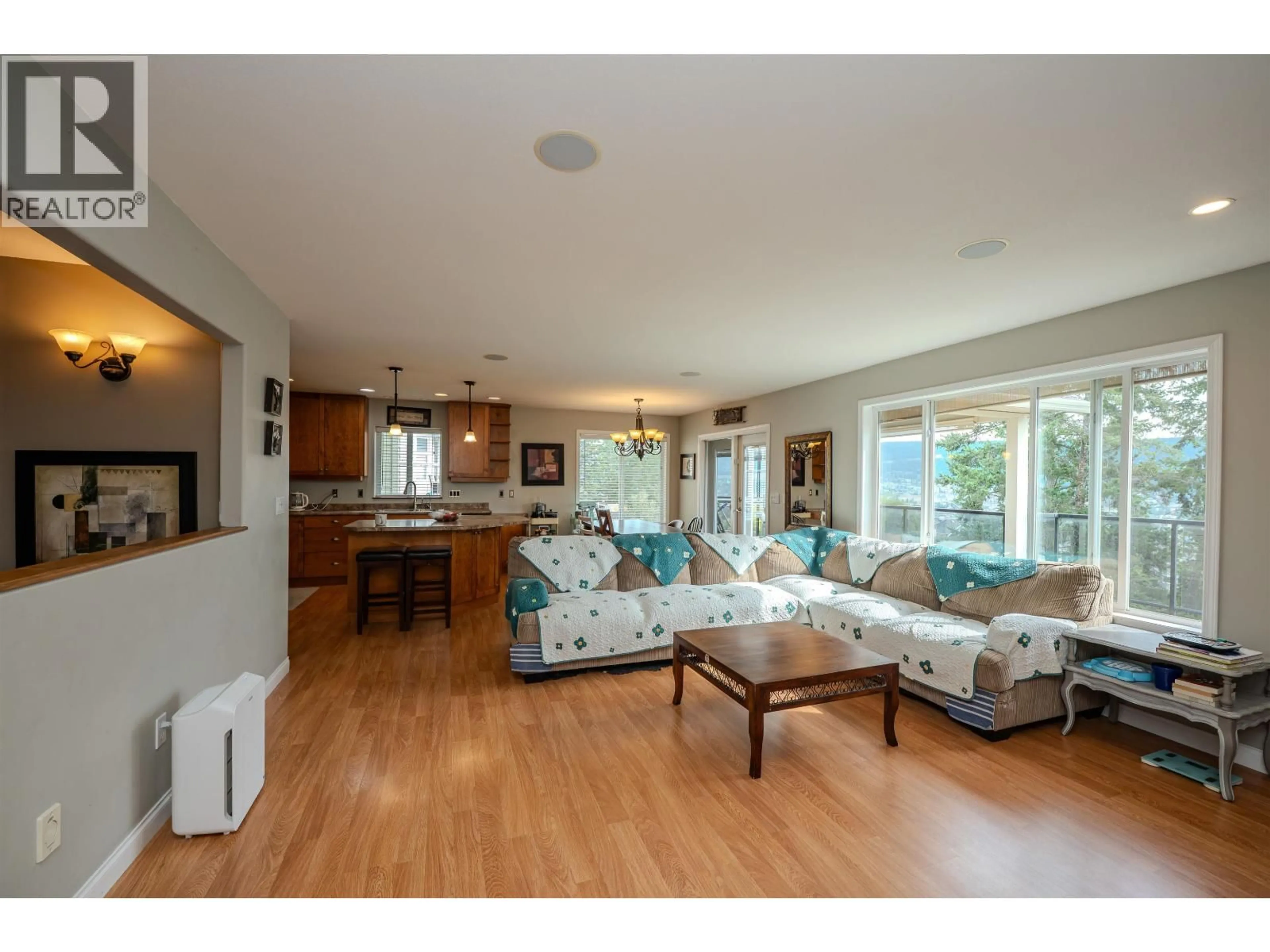 Living room with furniture, wood/laminate floor for 240 WESTRIDGE DRIVE, Williams Lake British Columbia V2G5H8