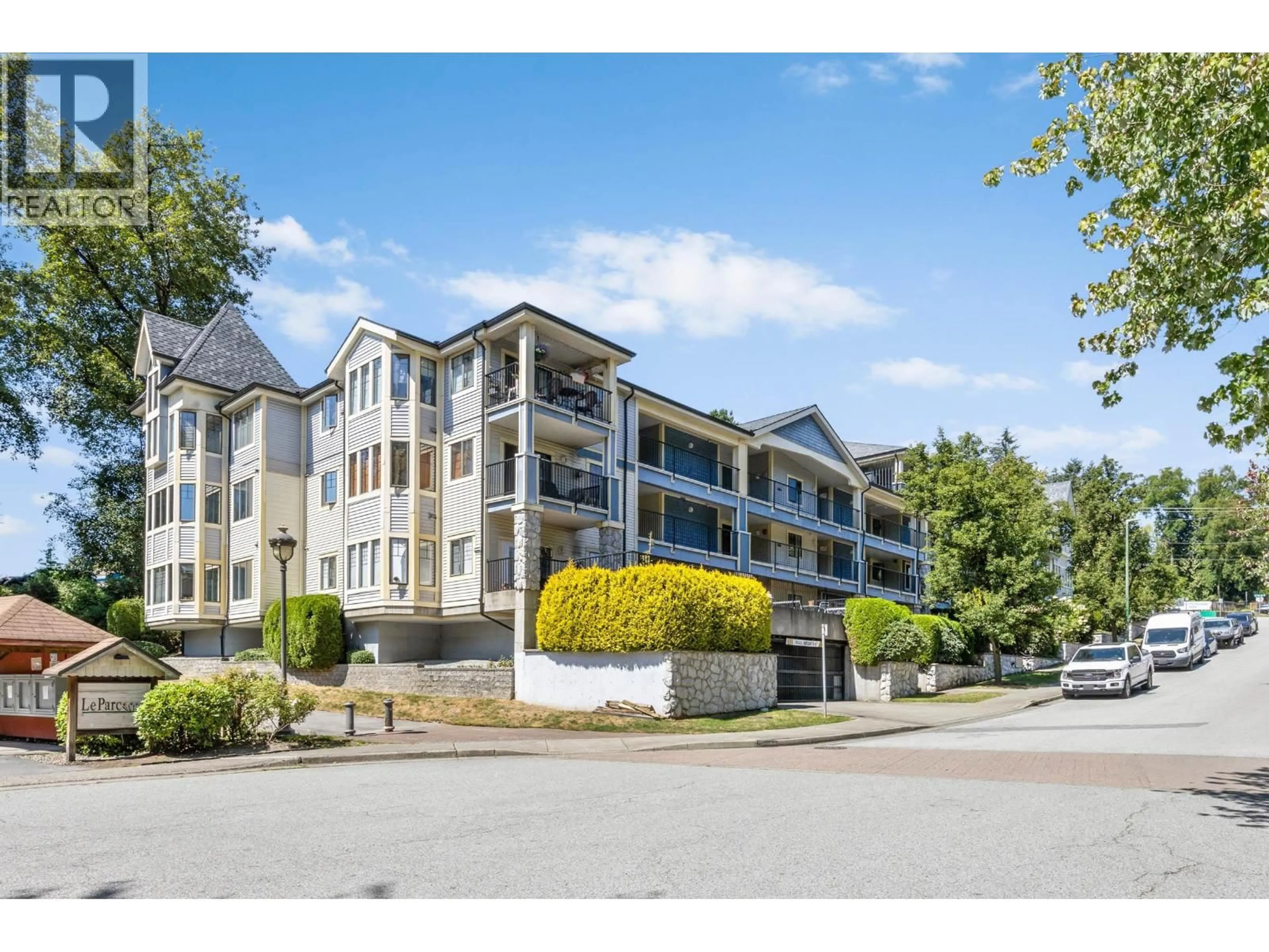 A pic from outside/outdoor area/front of a property/back of a property/a pic from drone, mountain view for 402 - 102 BEGIN STREET, Coquitlam British Columbia W3K4V2