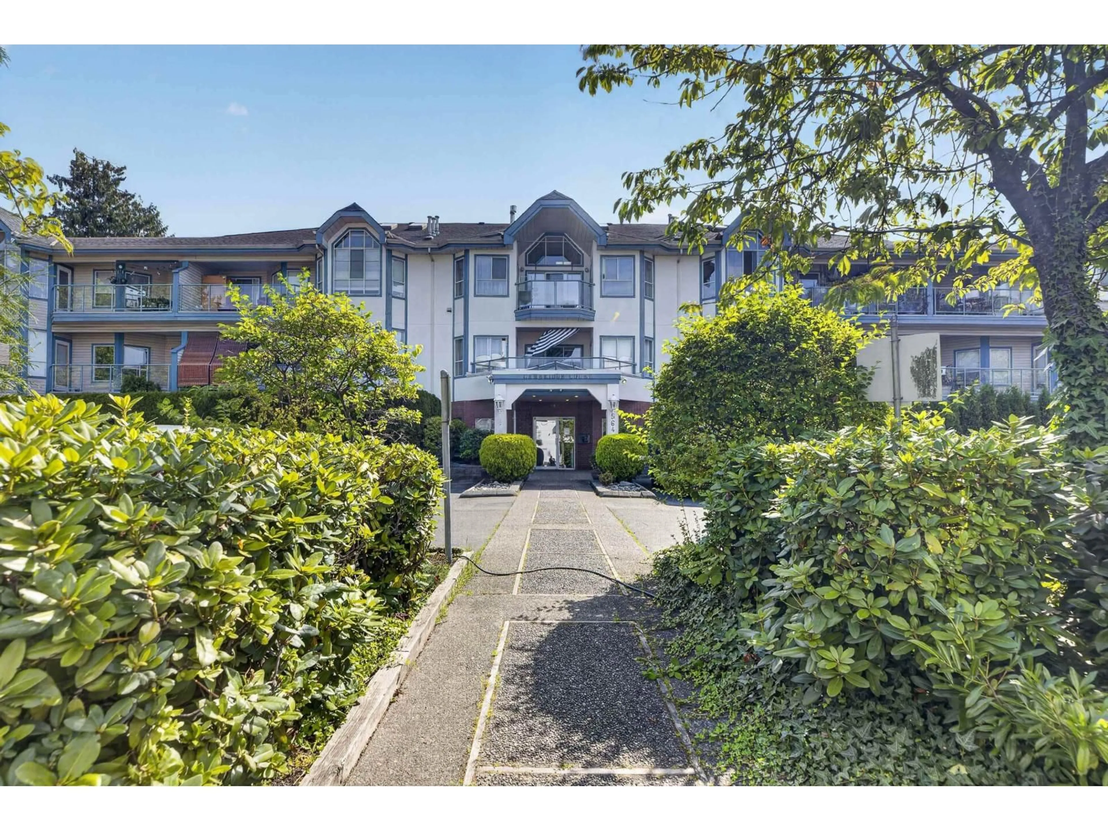 A pic from outside/outdoor area/front of a property/back of a property/a pic from drone, unknown for 204 - 5646 200 STREET, Langley British Columbia V3A1M8