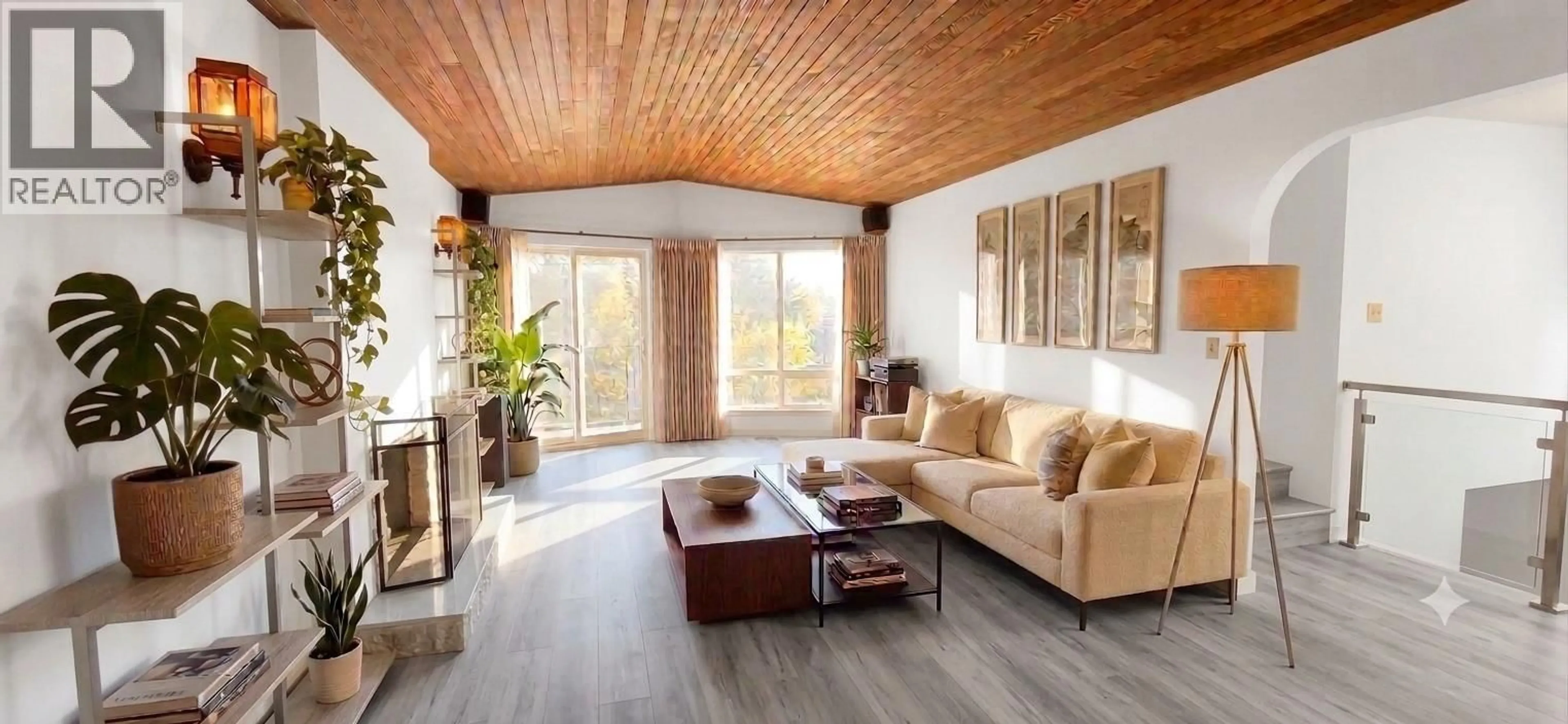 Living room with furniture, wood/laminate floor for 2986 3RD AVENUE, Vancouver British Columbia V5M1H8