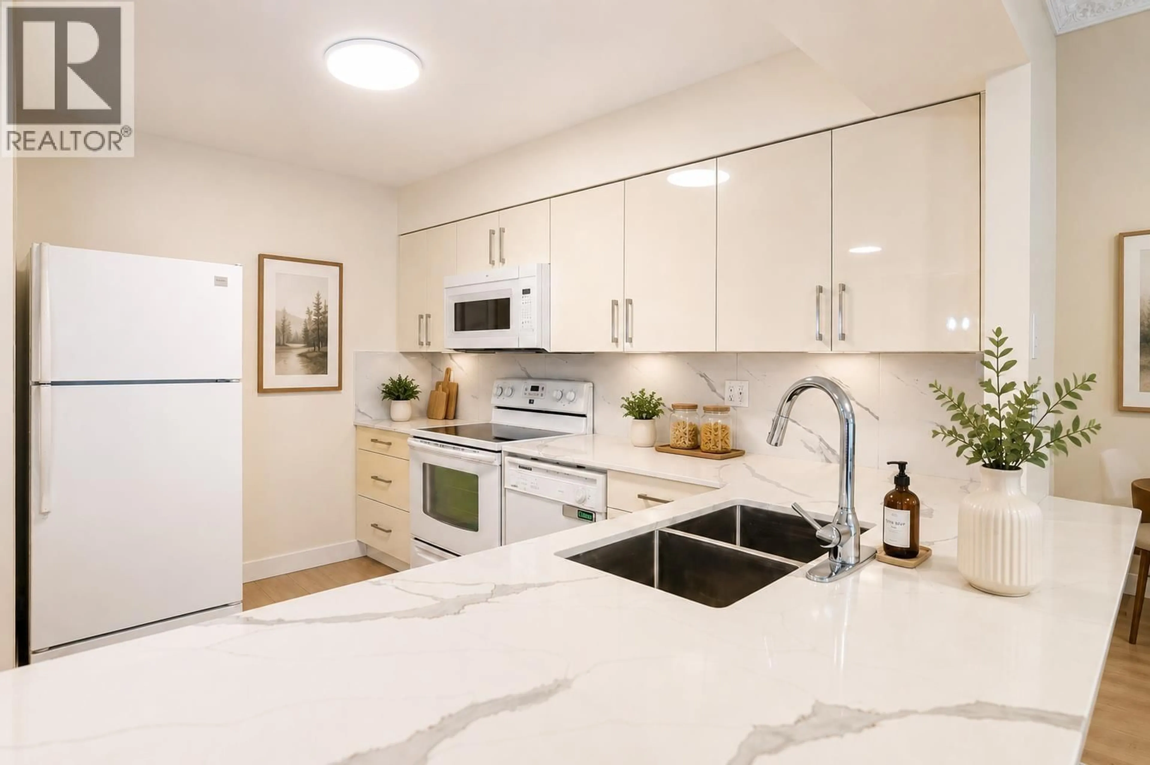 Open concept kitchen, ceramic/tile floor for 603 - 2468 BROADWAY, Vancouver British Columbia V5M4V1