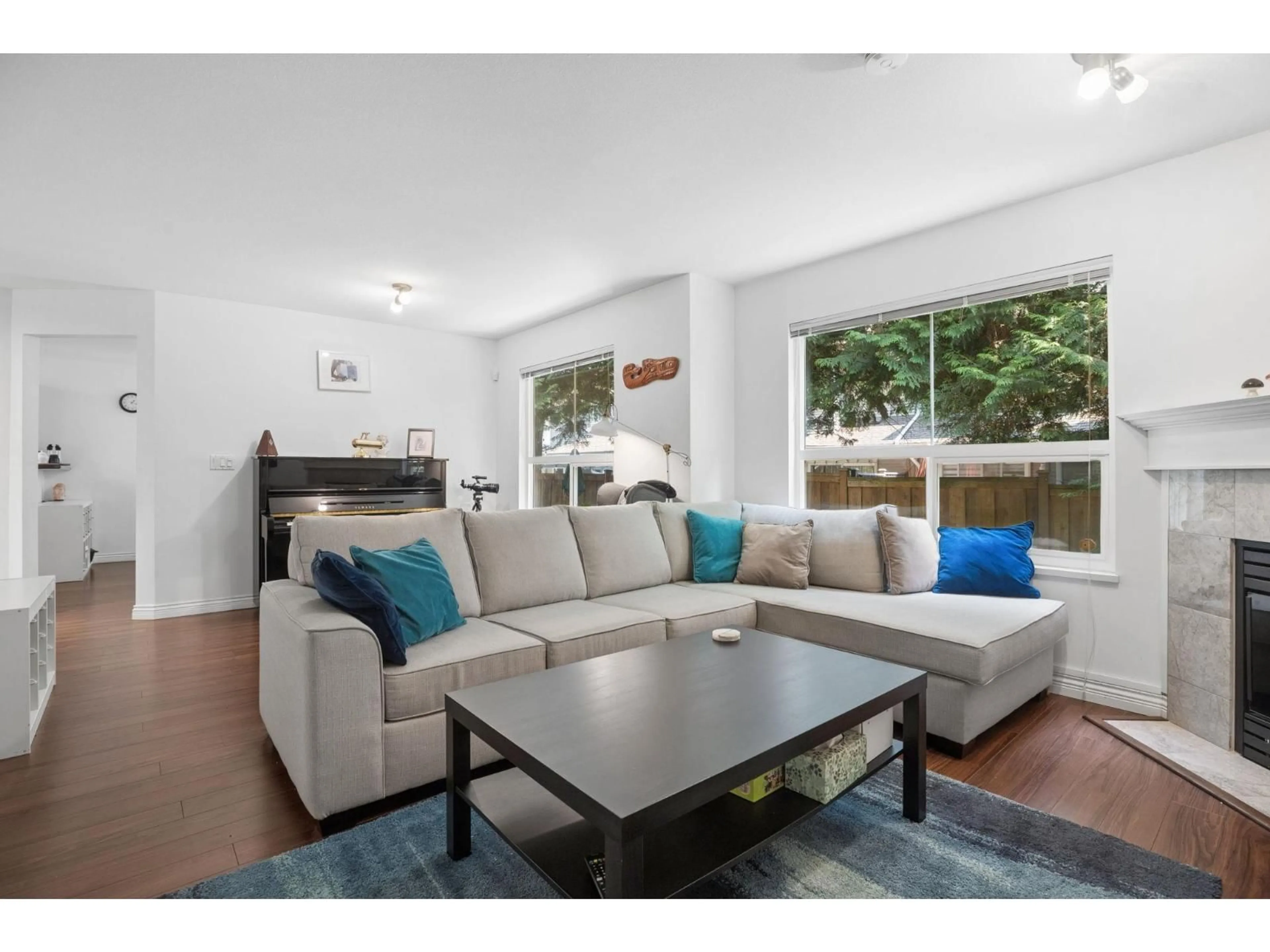 Living room with furniture, wood/laminate floor for 30 - 16155 82 AVENUE, Surrey British Columbia V4N0P7