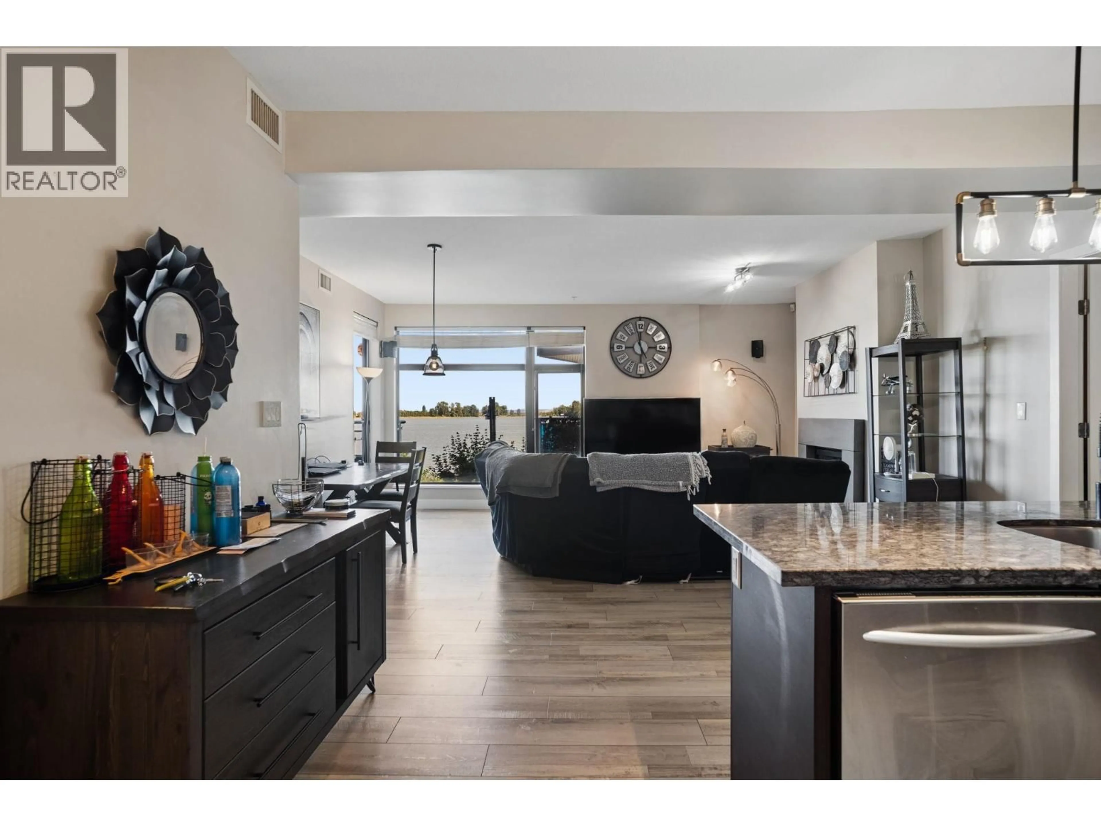 Open concept kitchen, ceramic/tile floor for 201 - 14300 RIVERPORT WAY, Richmond British Columbia V6W0A4