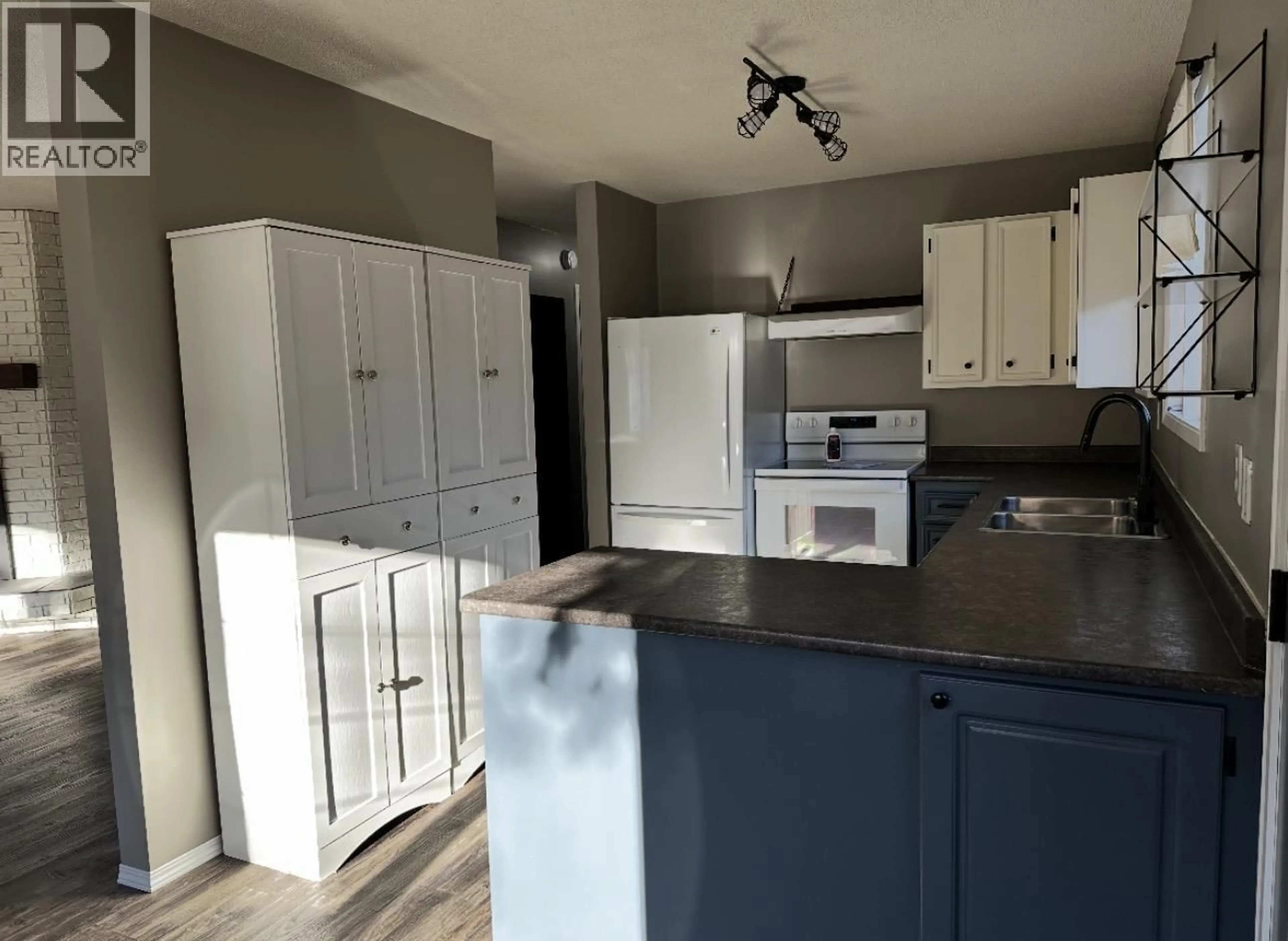 Open concept kitchen, unknown for 1210 ELKHORN CRESCENT, Prince George British Columbia V2M6J1