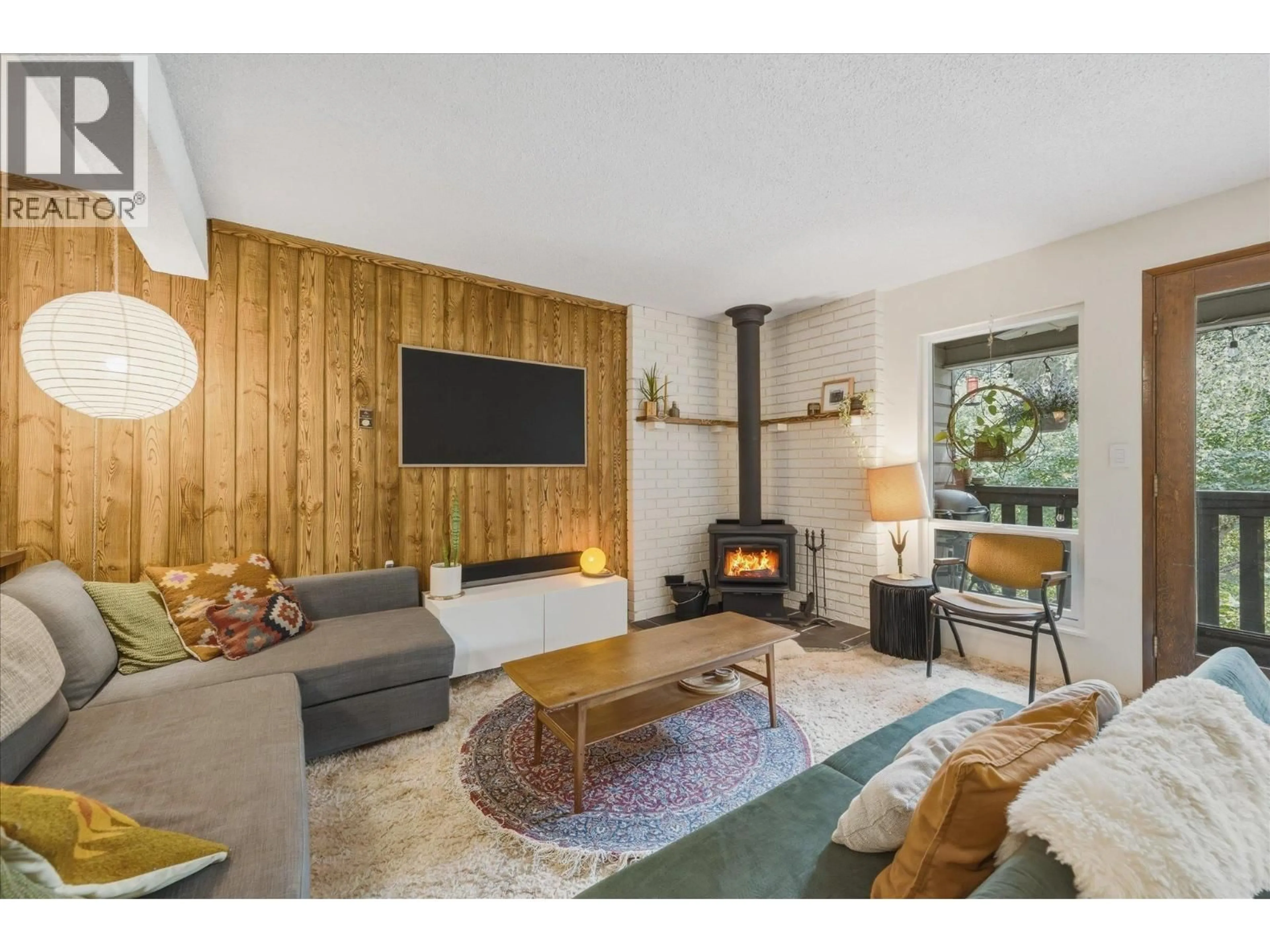 Living room with furniture, wood/laminate floor for 9 - 8138 CEDAR SPRINGS ROAD, Whistler British Columbia V8E0G2