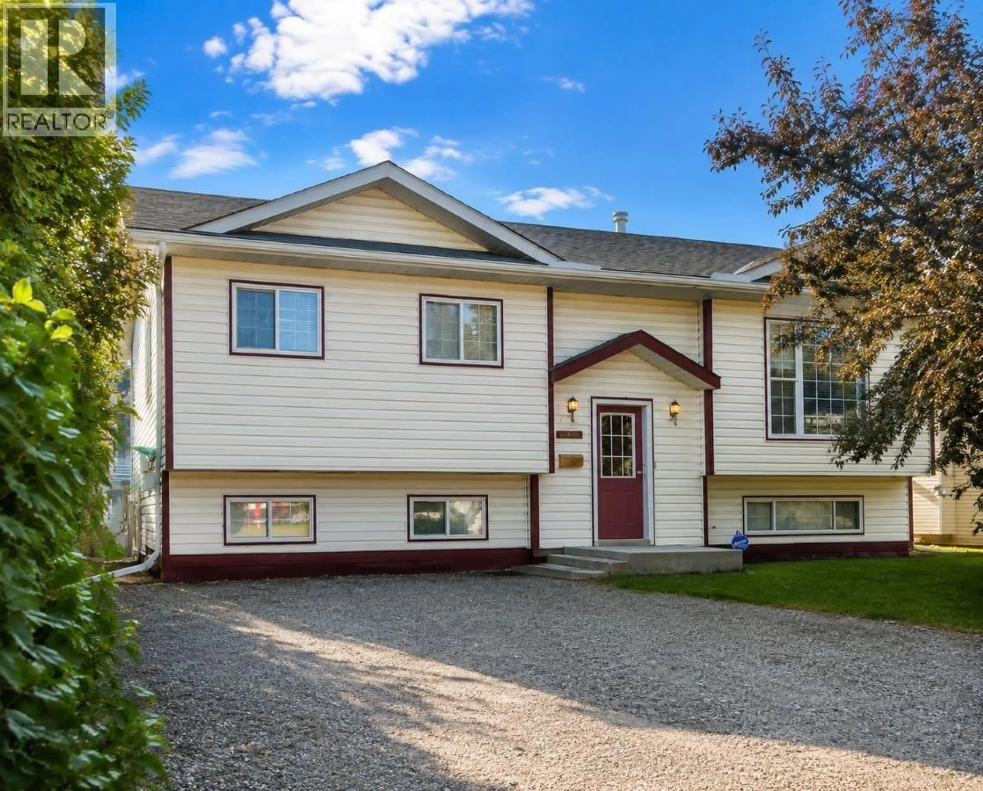 Home with vinyl exterior material, street for 8604 90 STREET, Fort St. John British Columbia V1J6S9