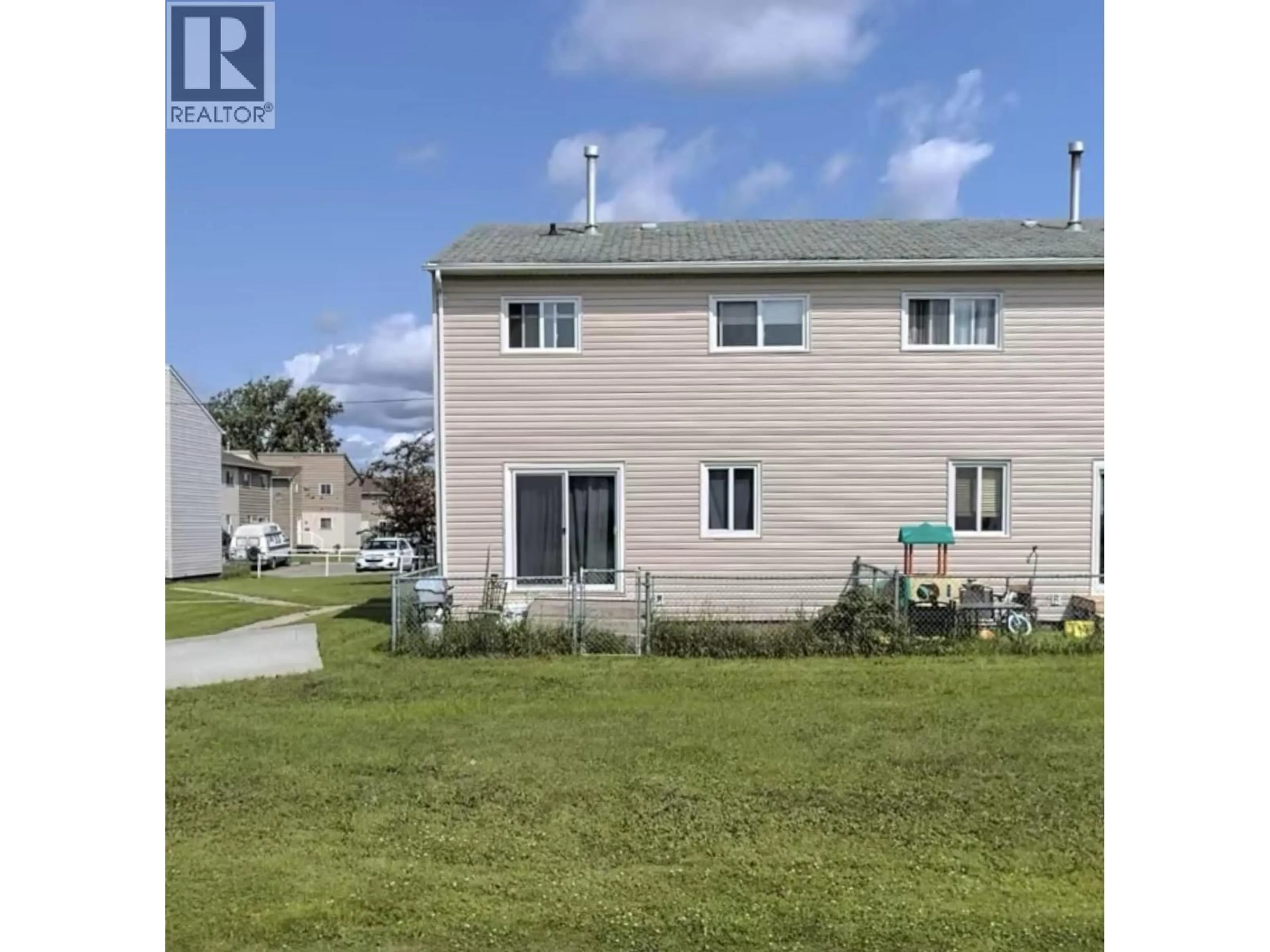 A pic from outside/outdoor area/front of a property/back of a property/a pic from drone, water/lake/river/ocean view for 8836 101 AVENUE, Fort St. John British Columbia V1J5G2