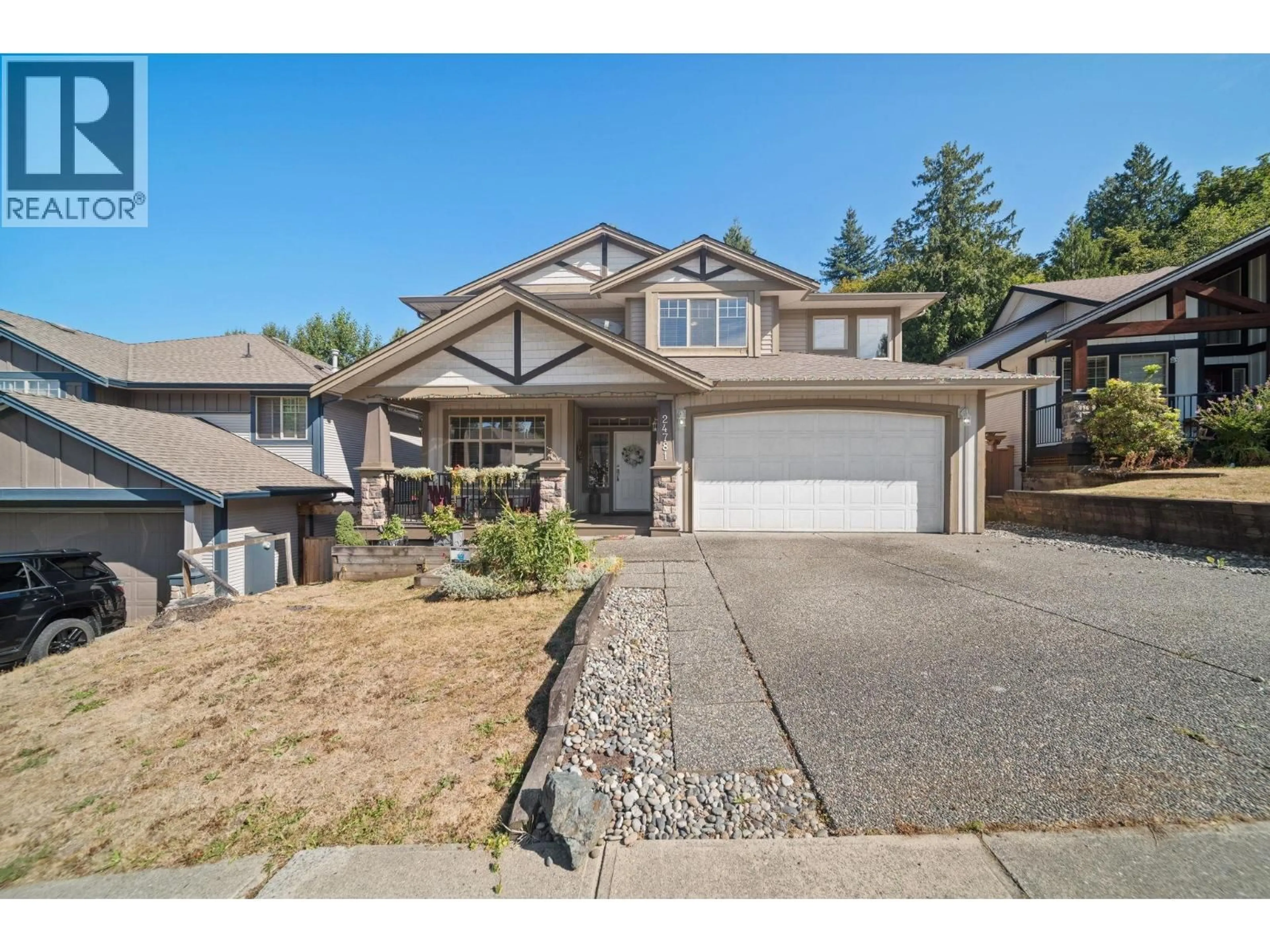 Home with vinyl exterior material, street for 24781 MCCLURE DRIVE, Maple Ridge British Columbia V2W0A5