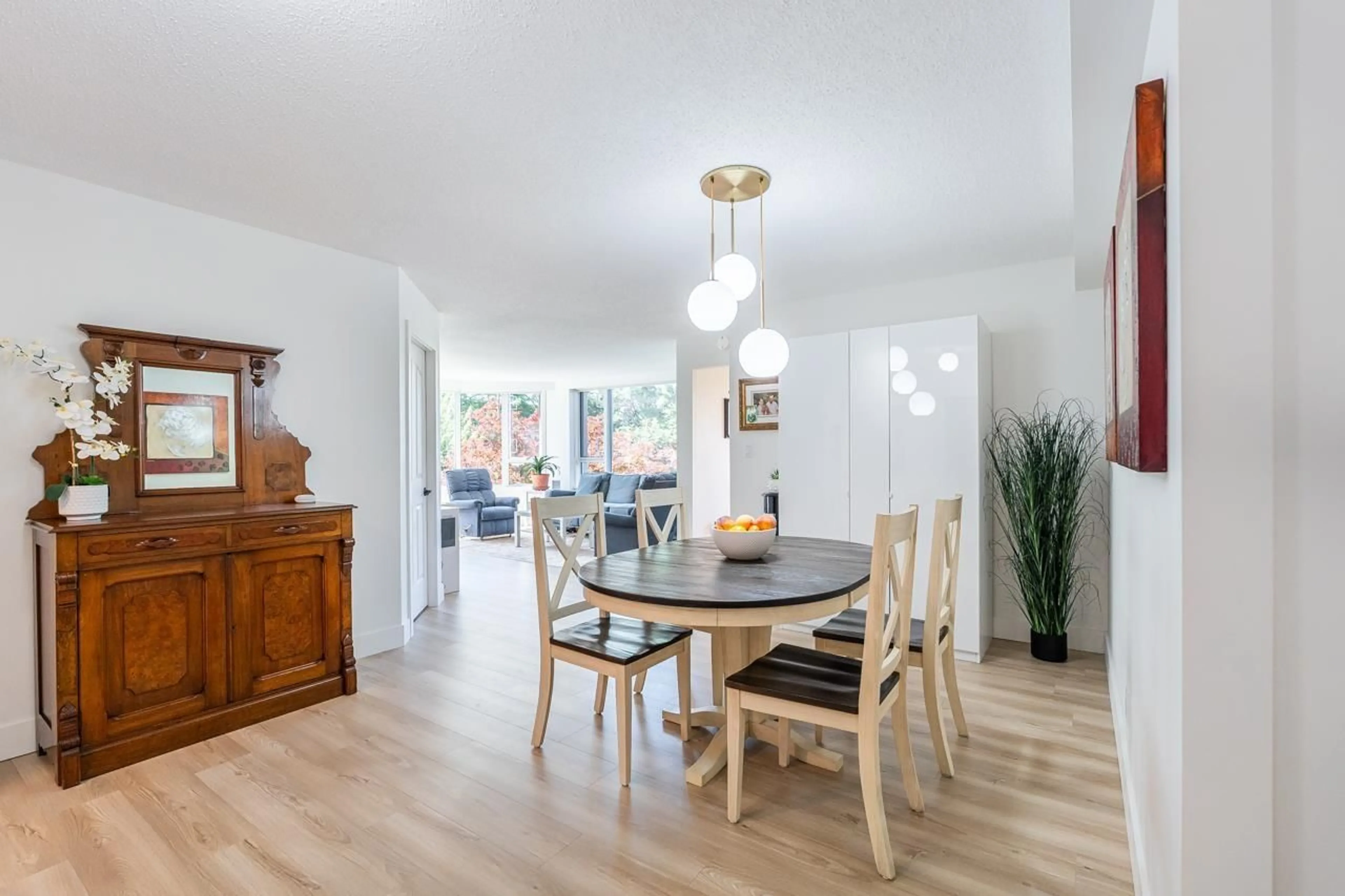 Dining room, wood/laminate floor for 201 - 3150 GLADWIN ROAD, Abbotsford British Columbia V2T5S9