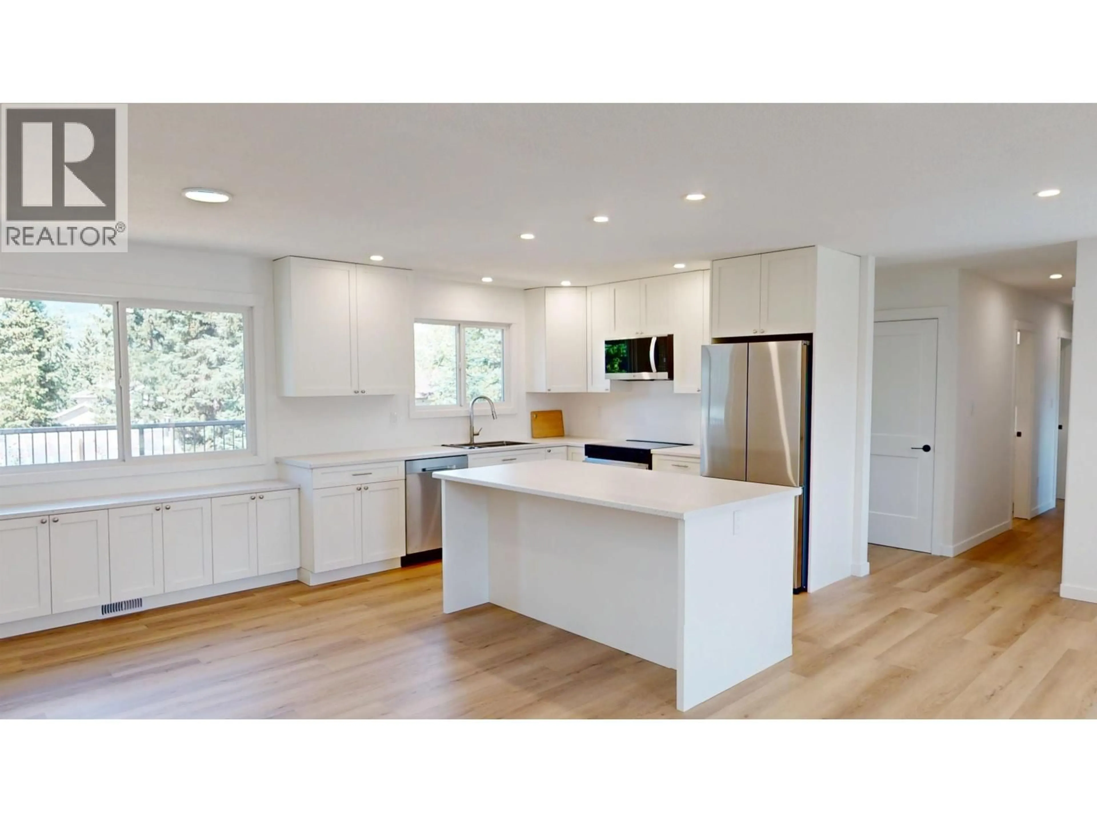 Open concept kitchen, wood/laminate floor for 1975 NADINA PLACE, Houston British Columbia V0J1Z0