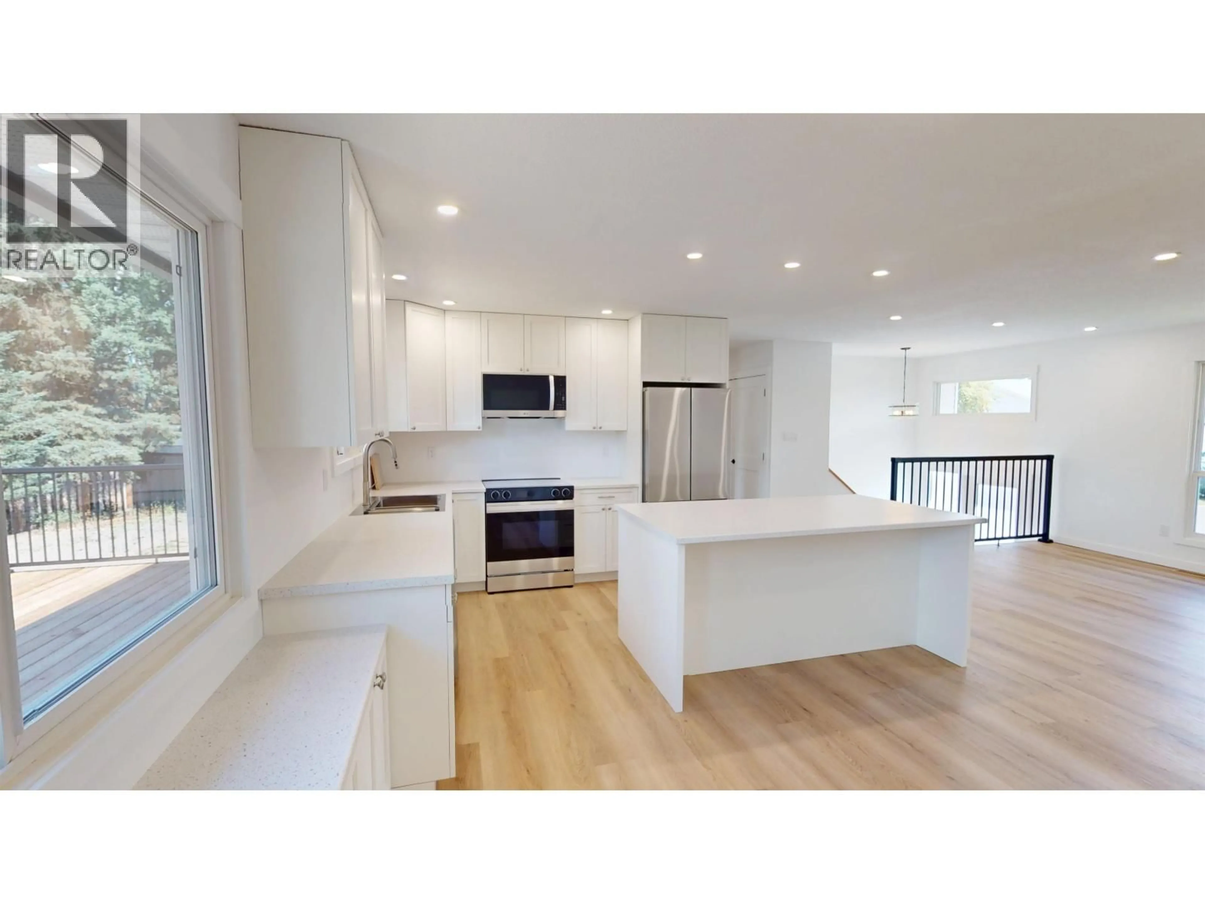Open concept kitchen, wood/laminate floor for 1975 NADINA PLACE, Houston British Columbia V0J1Z0