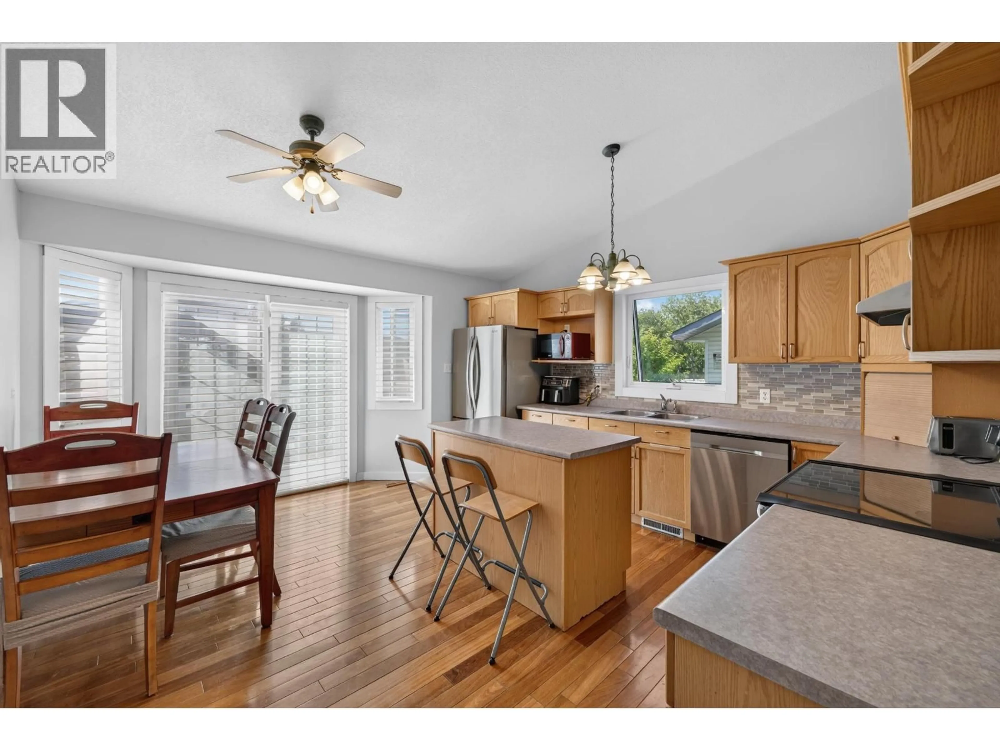 Open concept kitchen, unknown for 9007 112 AVENUE, Fort St. John British Columbia V1J6G2