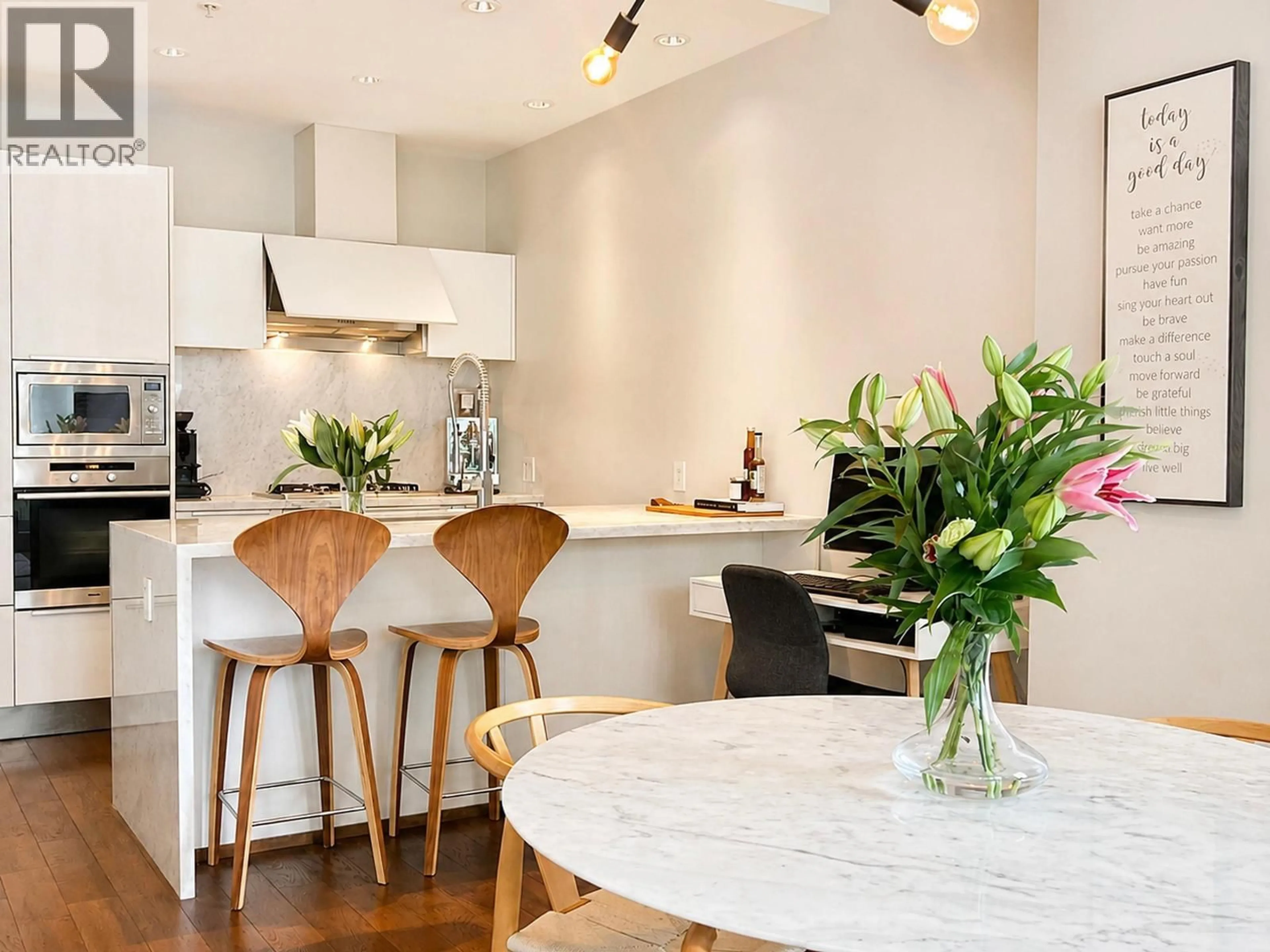 Contemporary kitchen, wood/laminate floor for 406 - 1633 ONTARIO STREET, Vancouver British Columbia V5Y0C2
