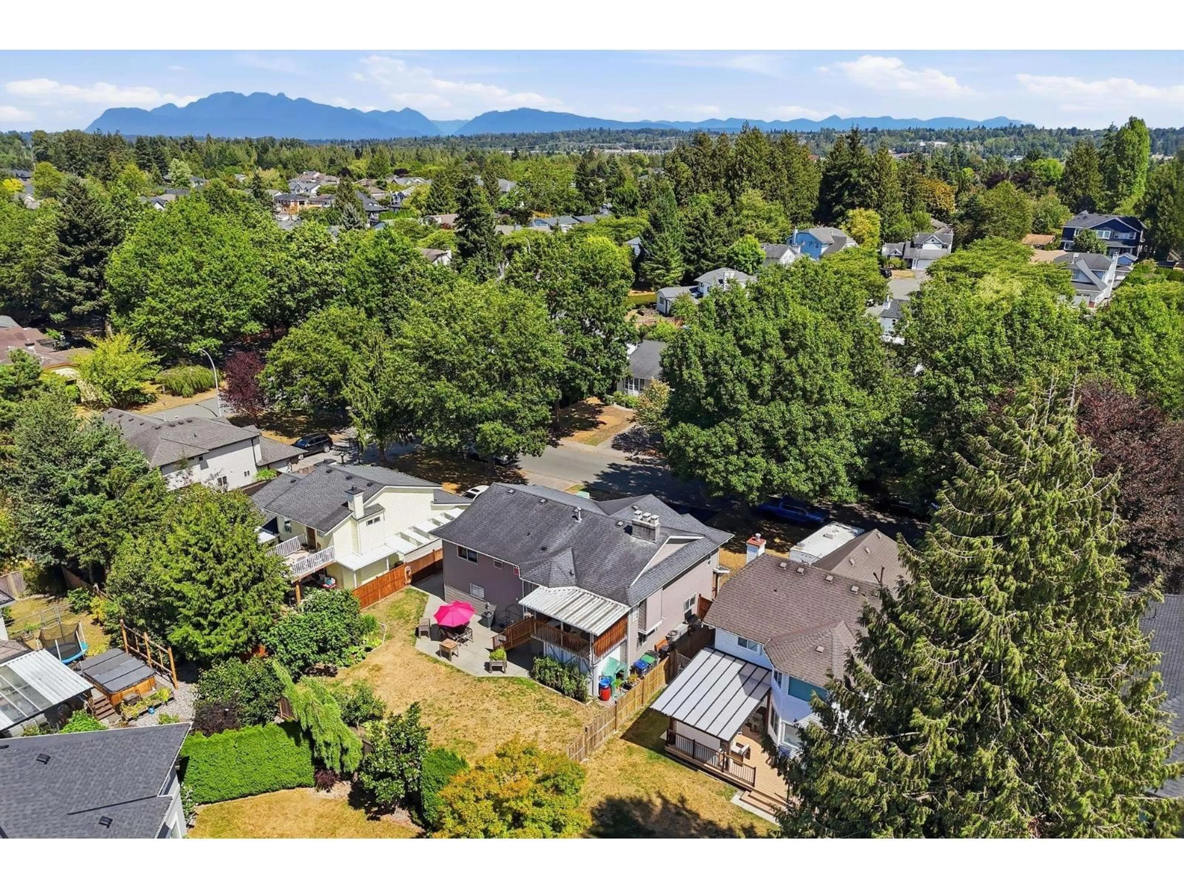 A pic from outside/outdoor area/front of a property/back of a property/a pic from drone, mountain view for 5873 169 STREET, Surrey British Columbia V3S7A1